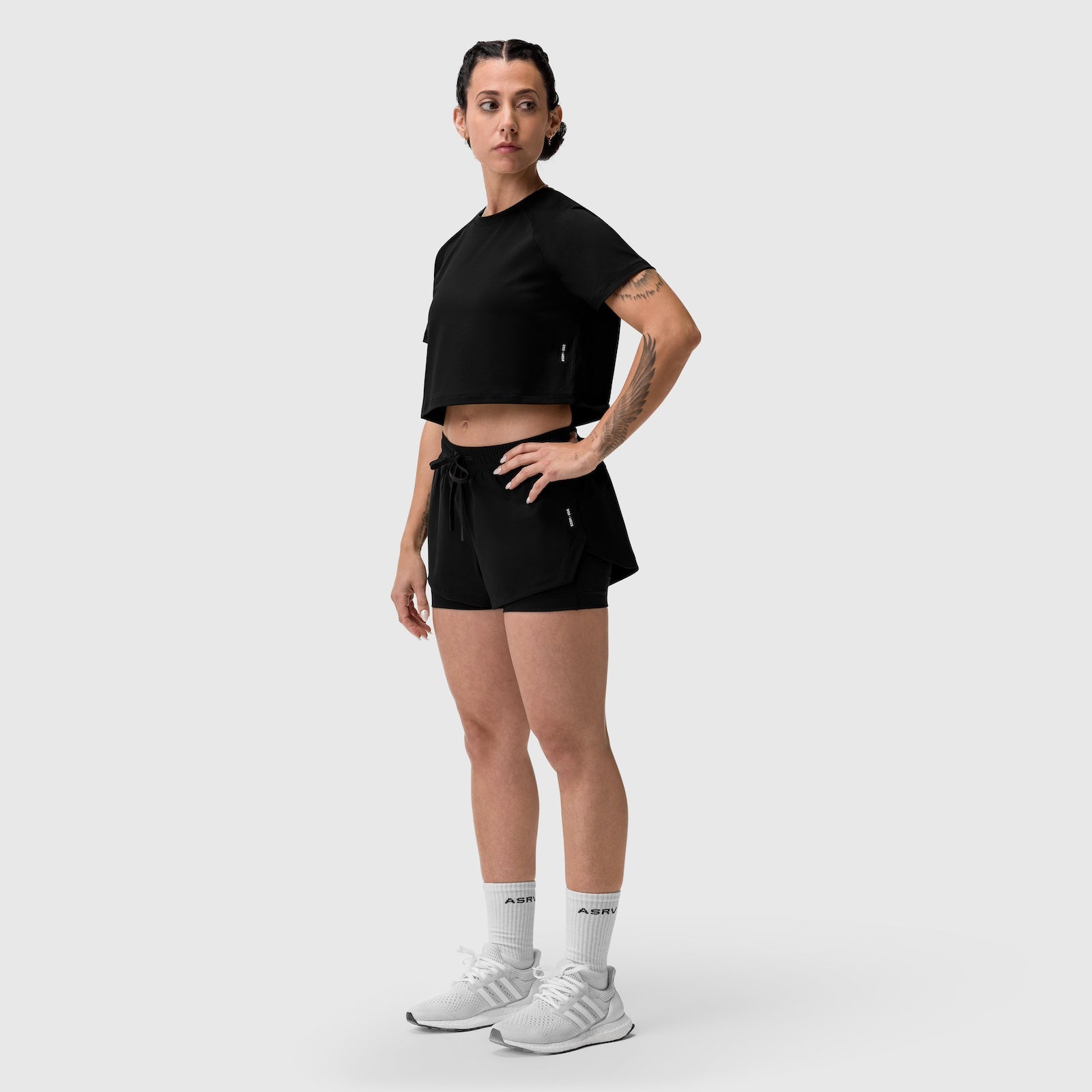 Tetra-Lite Liner Short in black, worn with cropped tee, front pose