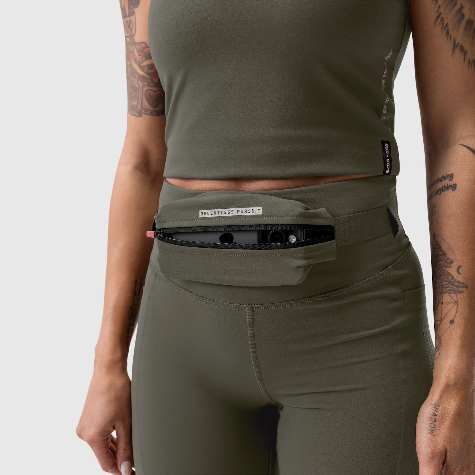 W030 Lycra 3-in-1 Legging in olive worn by model, front view showing waistband pocket