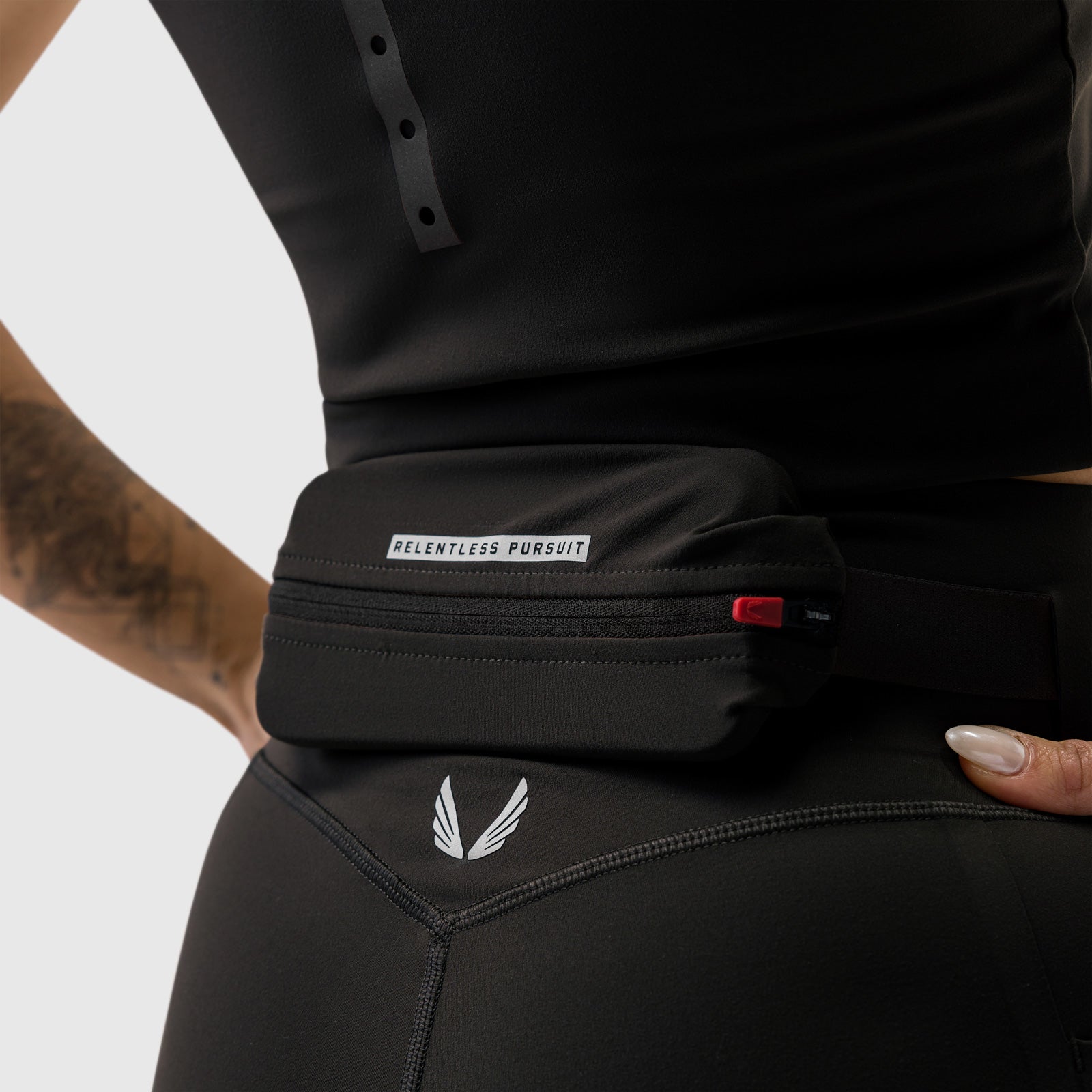 W030 LYCRA® 3-in-1 Legging in black worn by model, waist detail