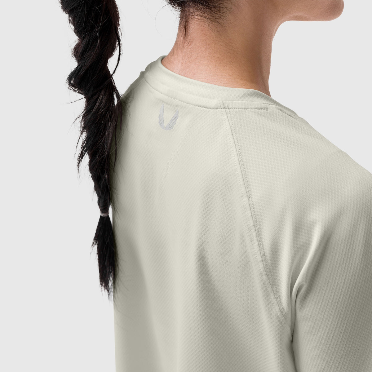 AeroSilver Cropped Tee in ivory cream, worn by model shown from back
