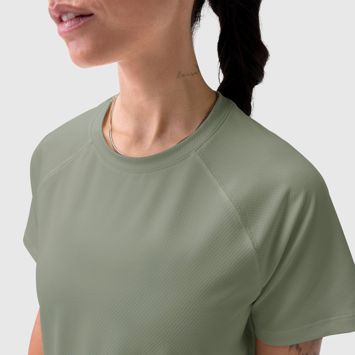 AeroSilver® Cropped Tee in sage worn by model, front view