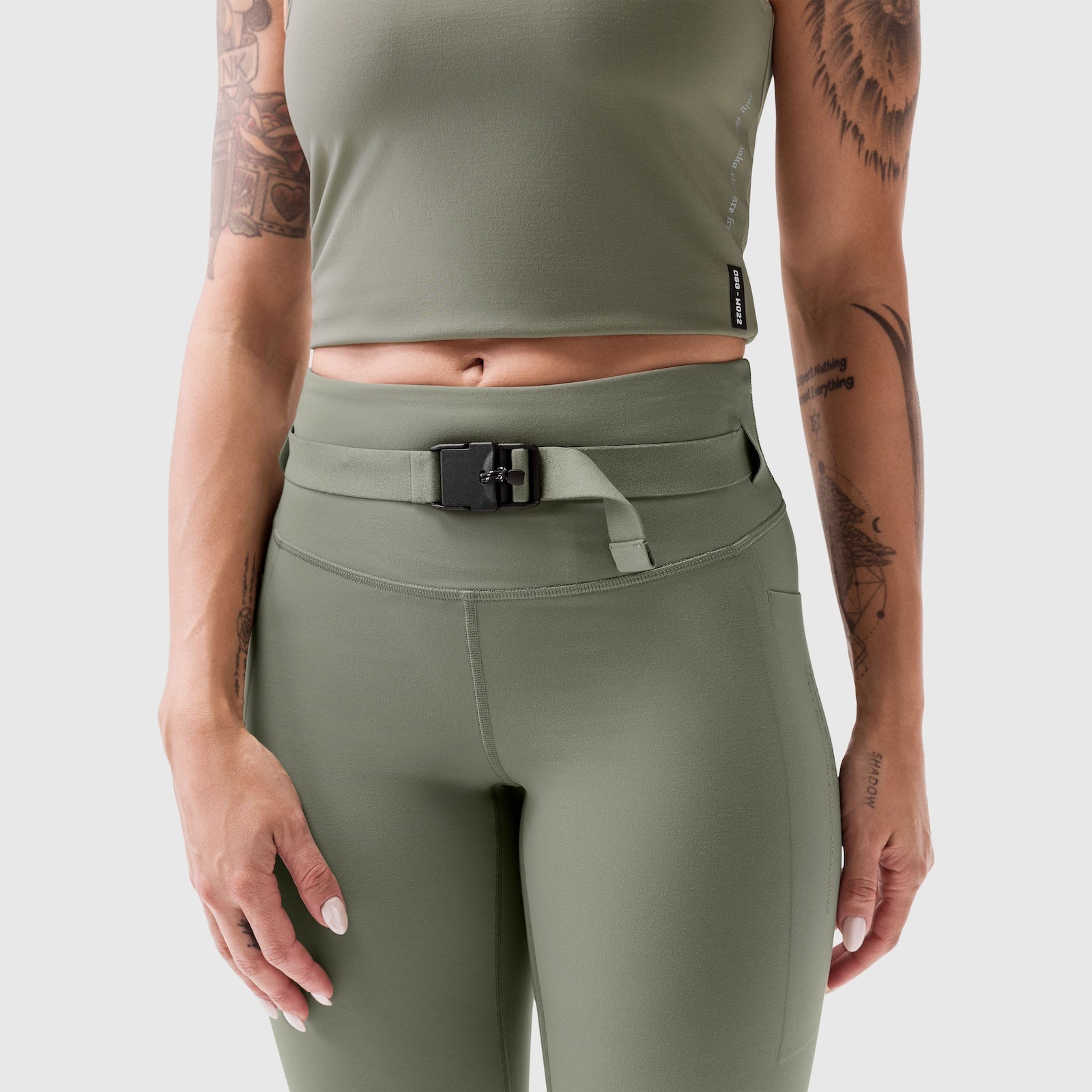 W030 LYCRA 3-in-1 Legging in sage worn by model with belt, front view