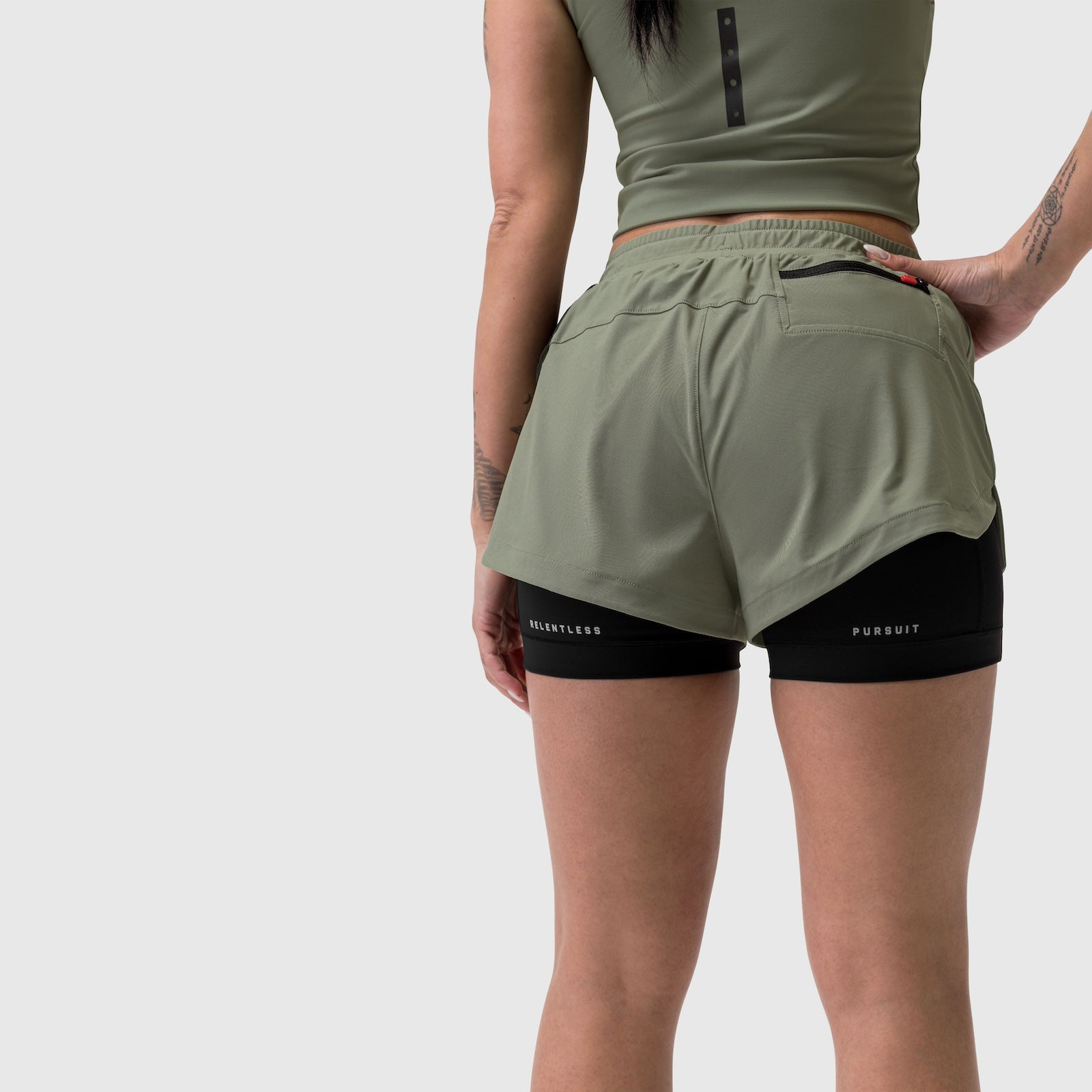 Tetra-Lite® Liner Short in sage worn by model, back view showing layered shorts design