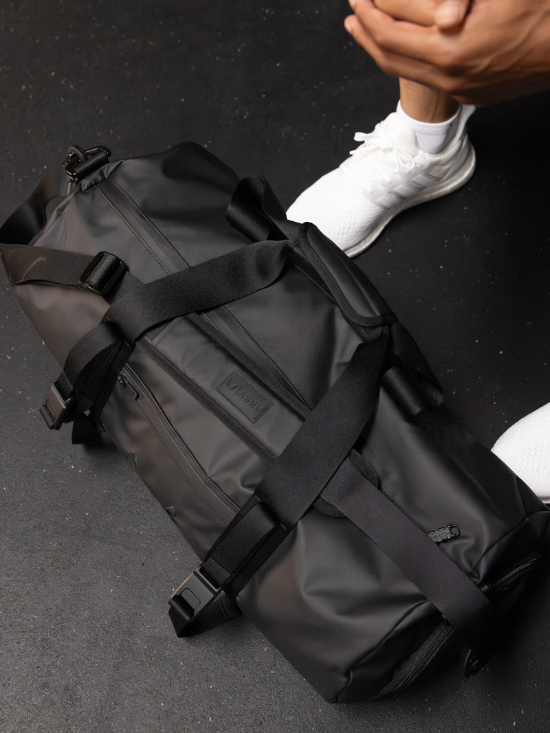 1229. Water Resistant Barrel Duffle Bag 45L - Black