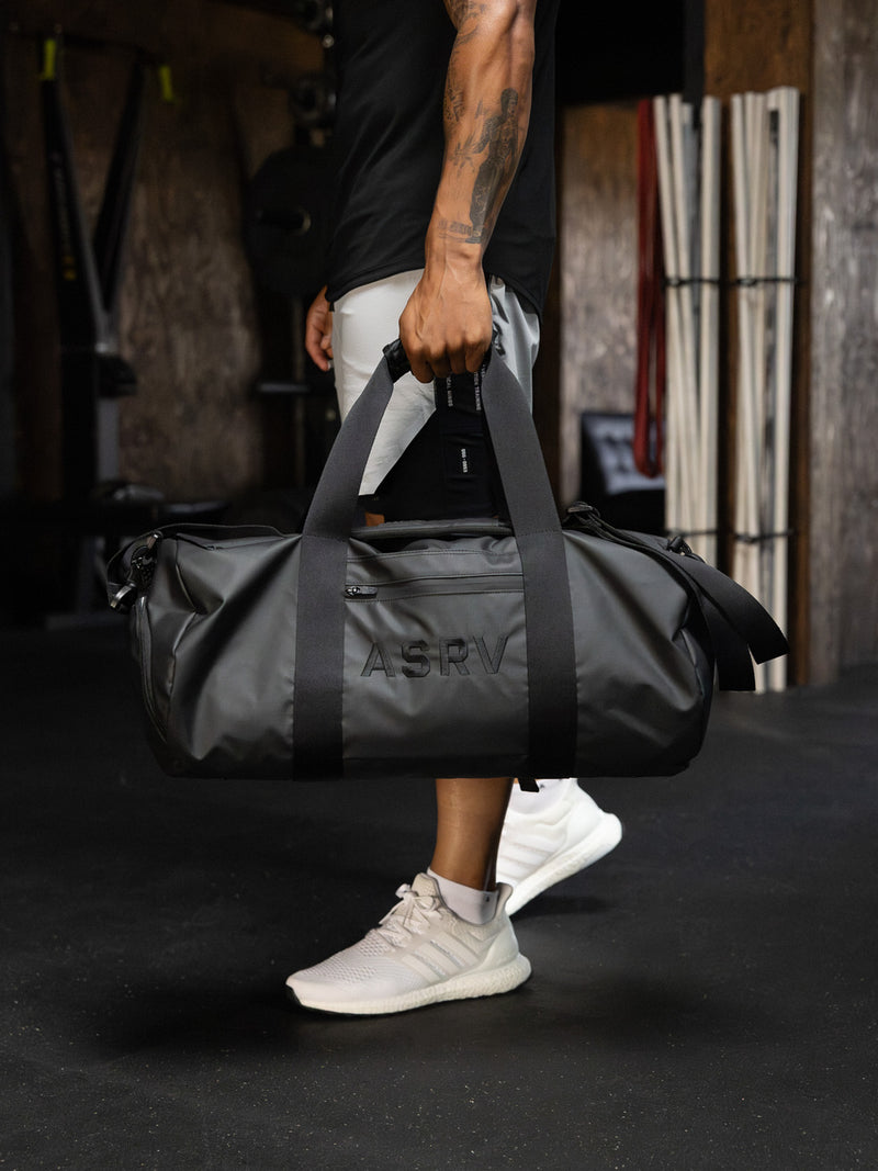 1229. Water Resistant Barrel Duffle Bag 45L - Black