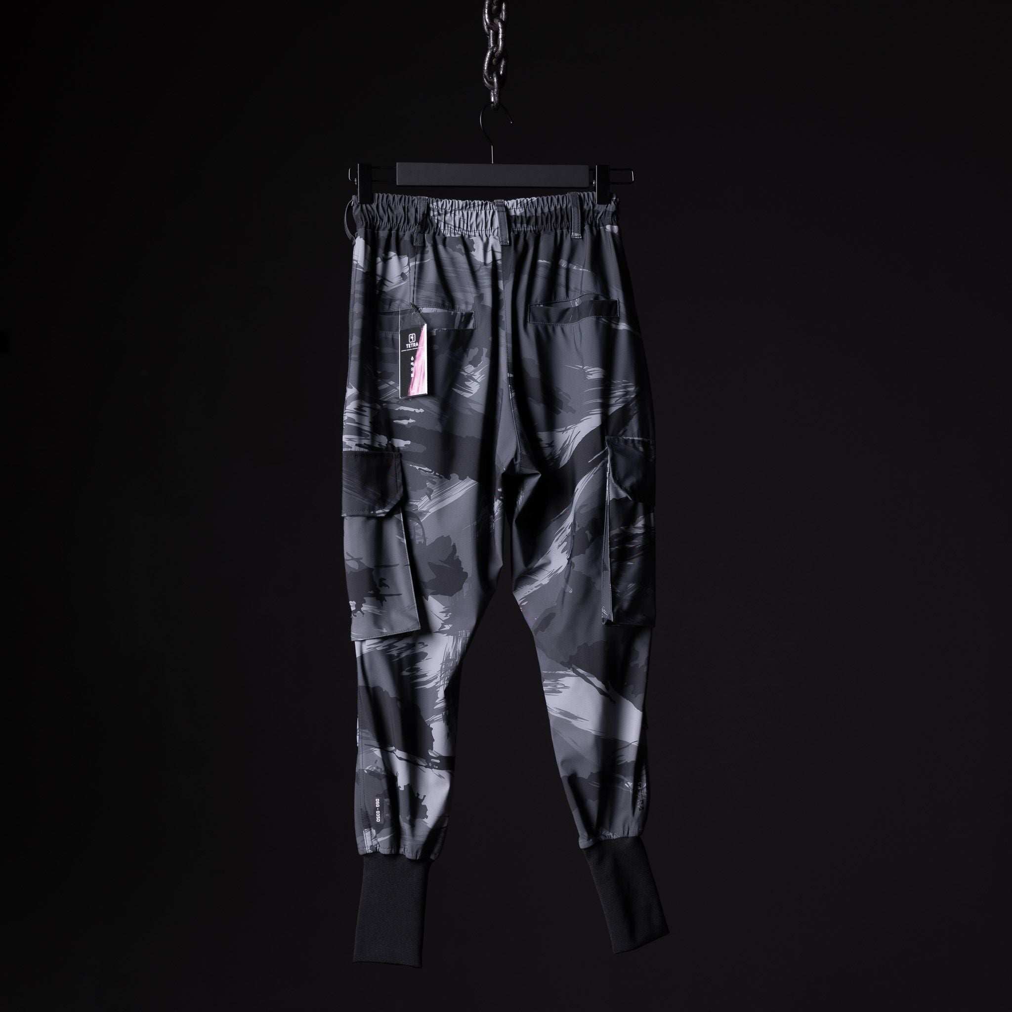 flatlay SM'20 Cargo High Rib joggers in grey camo print, front view