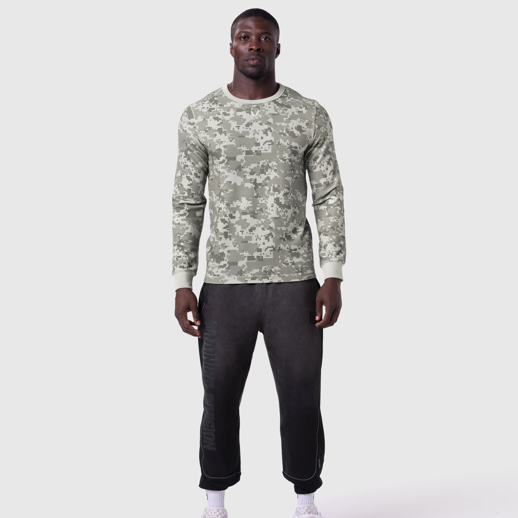 Waffle Knit Longsleeve in digital camo worn with black joggers, front view