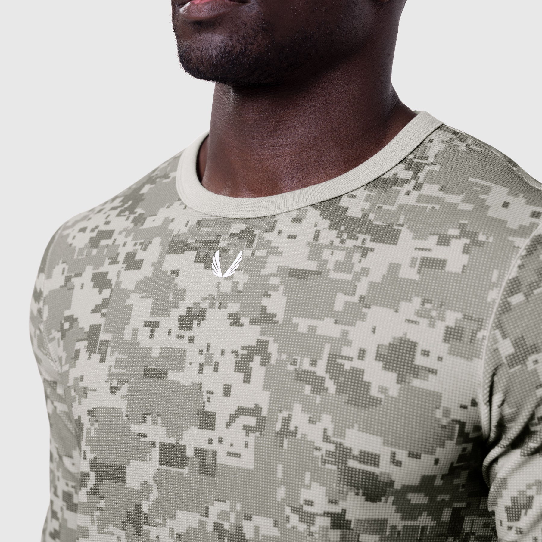Waffle knit longsleeve in digital camo, worn by model, chest and shoulder detail