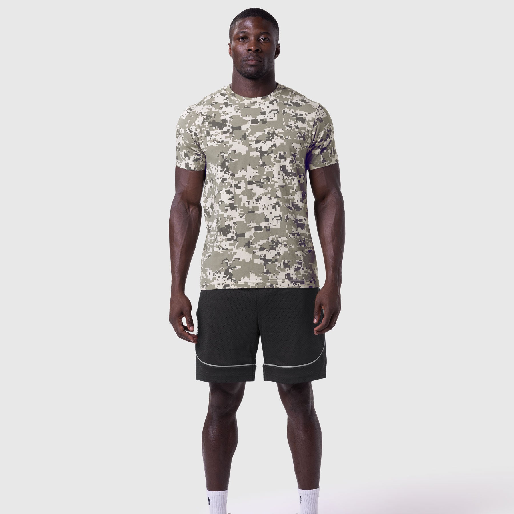 Supima Essential Tee in digital camo worn with black shorts, front view
