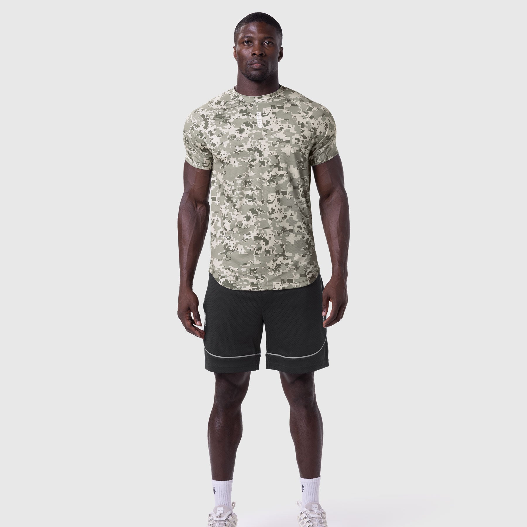 AeroSilver Established Tee in digital camo blade worn by male model with black shorts, front view