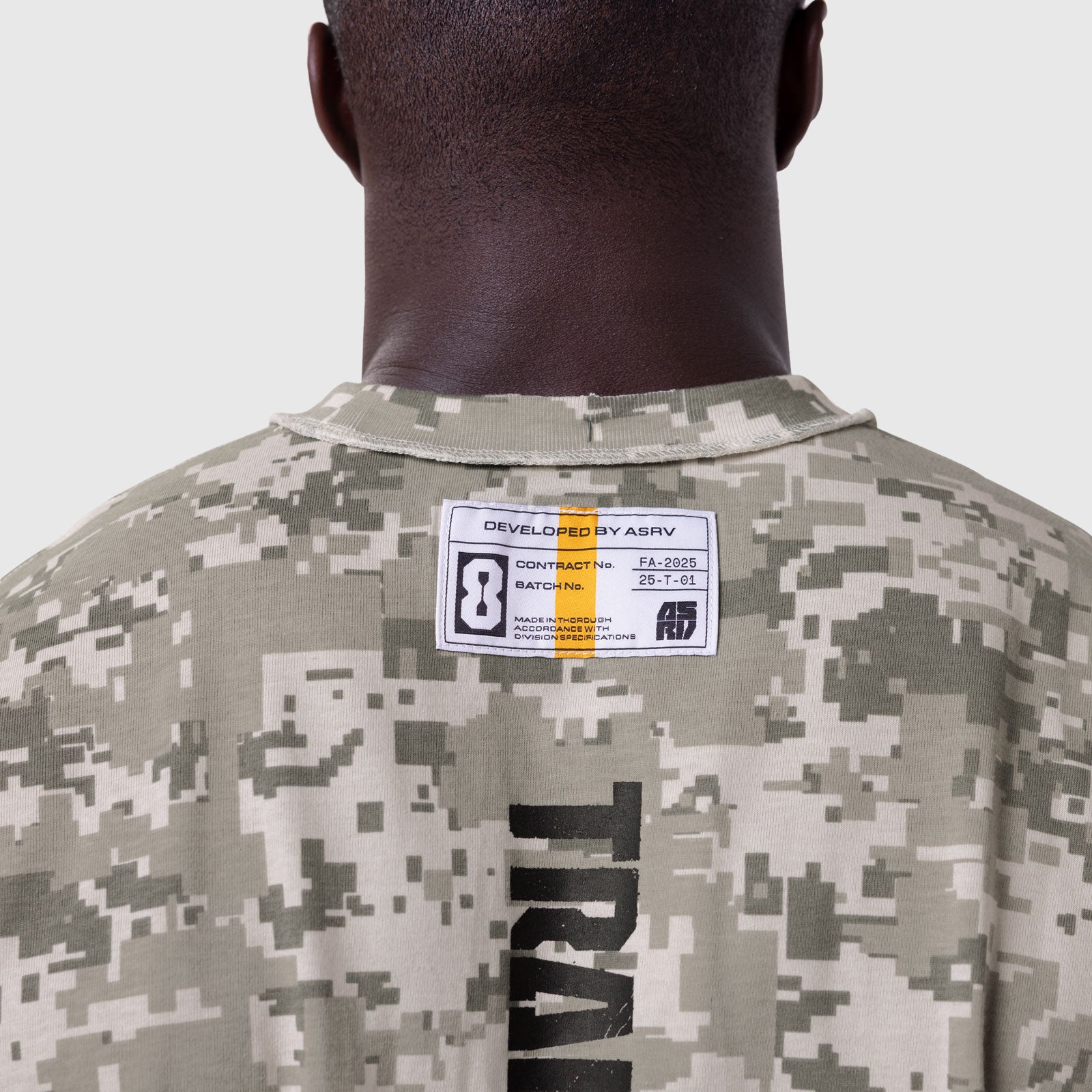 Tech Essential Cap Shoulder Cutoff in digital camo, back view on model showing label detail