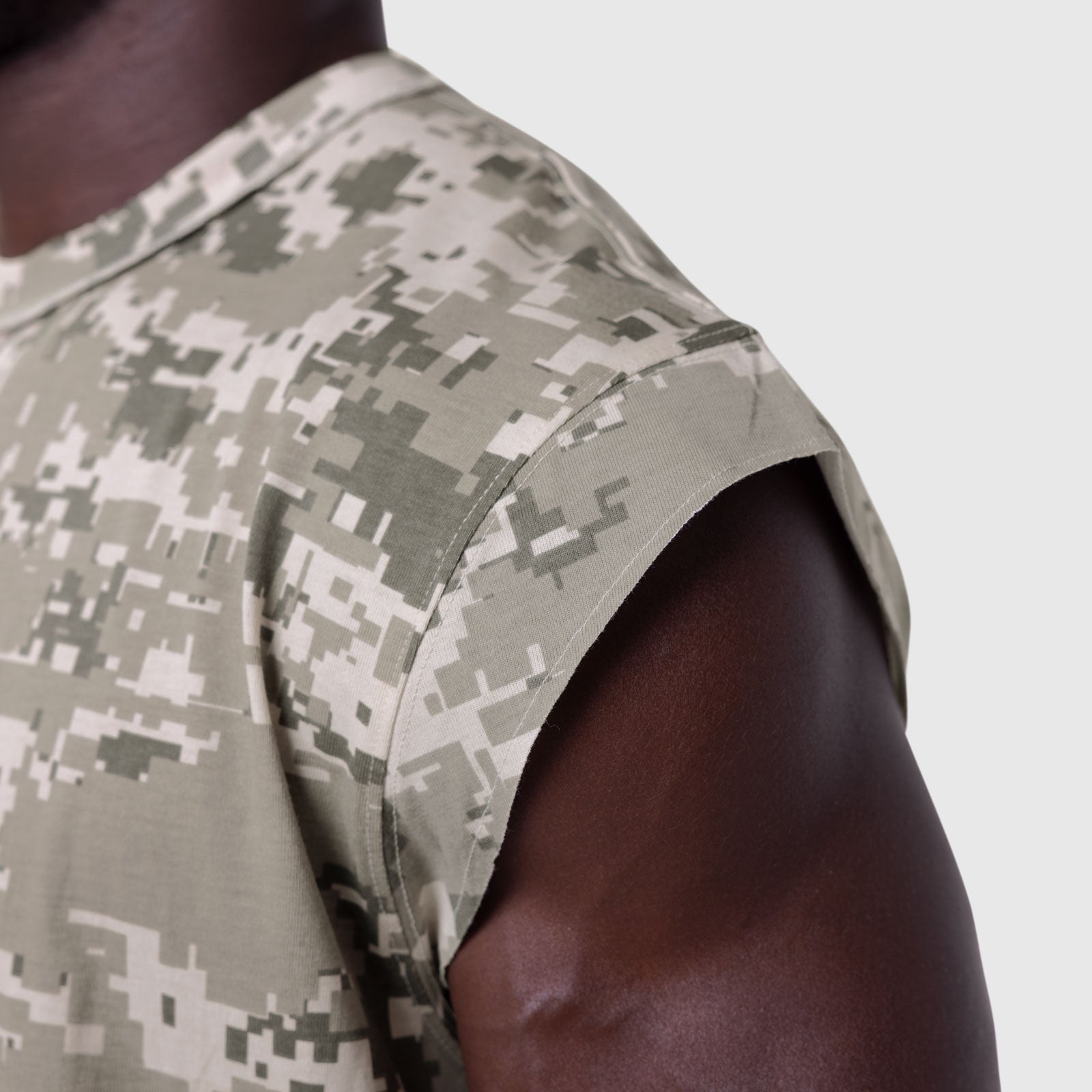 Tech Essential Cap Shoulder Cutoff in digital camo worn by model, shoulder detail view