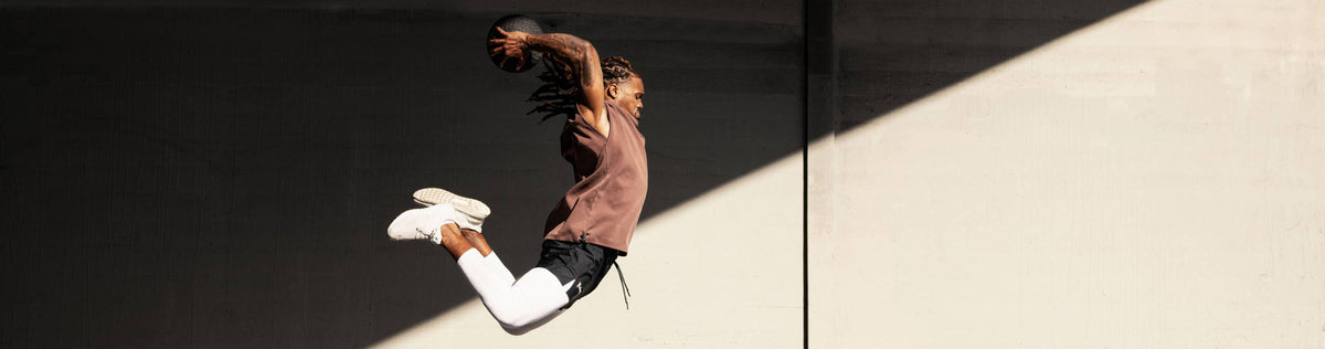 ASRV athlete jumping with basketball