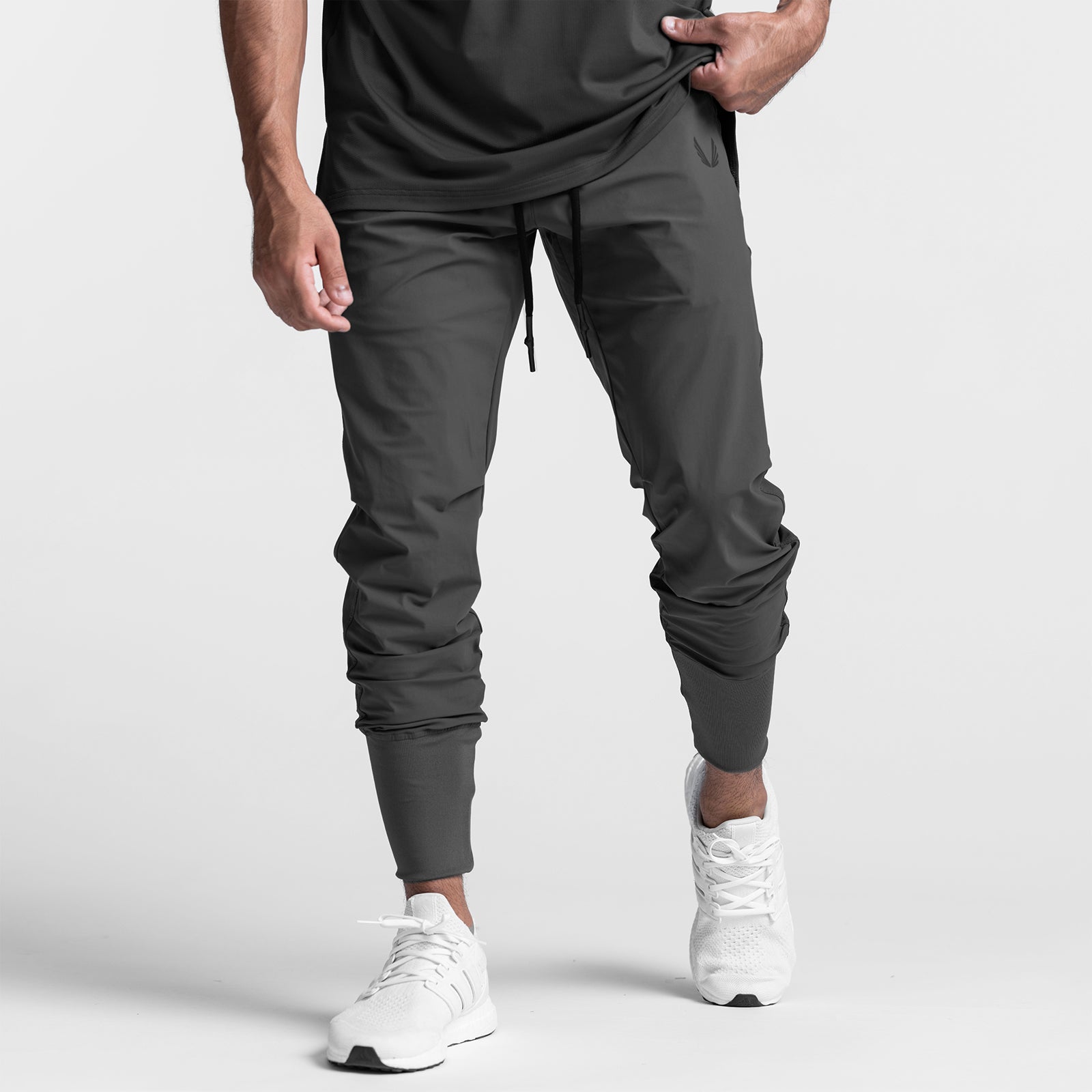 Tetra-Lite High Rib Jogger in space grey, modeled from waist down with white sneakers