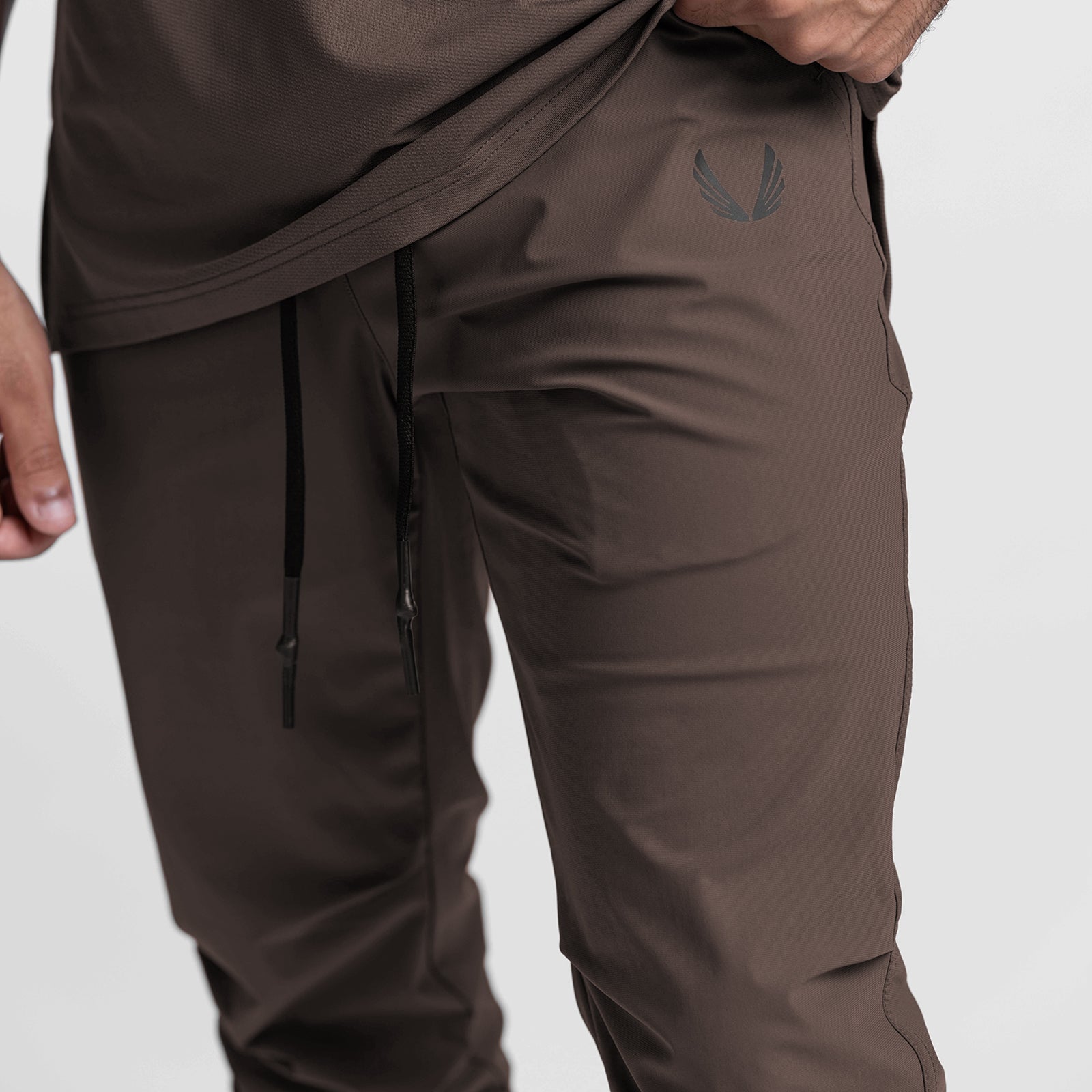 Tetra-Lite High Rib Jogger in deep taupe worn by model, side view detail