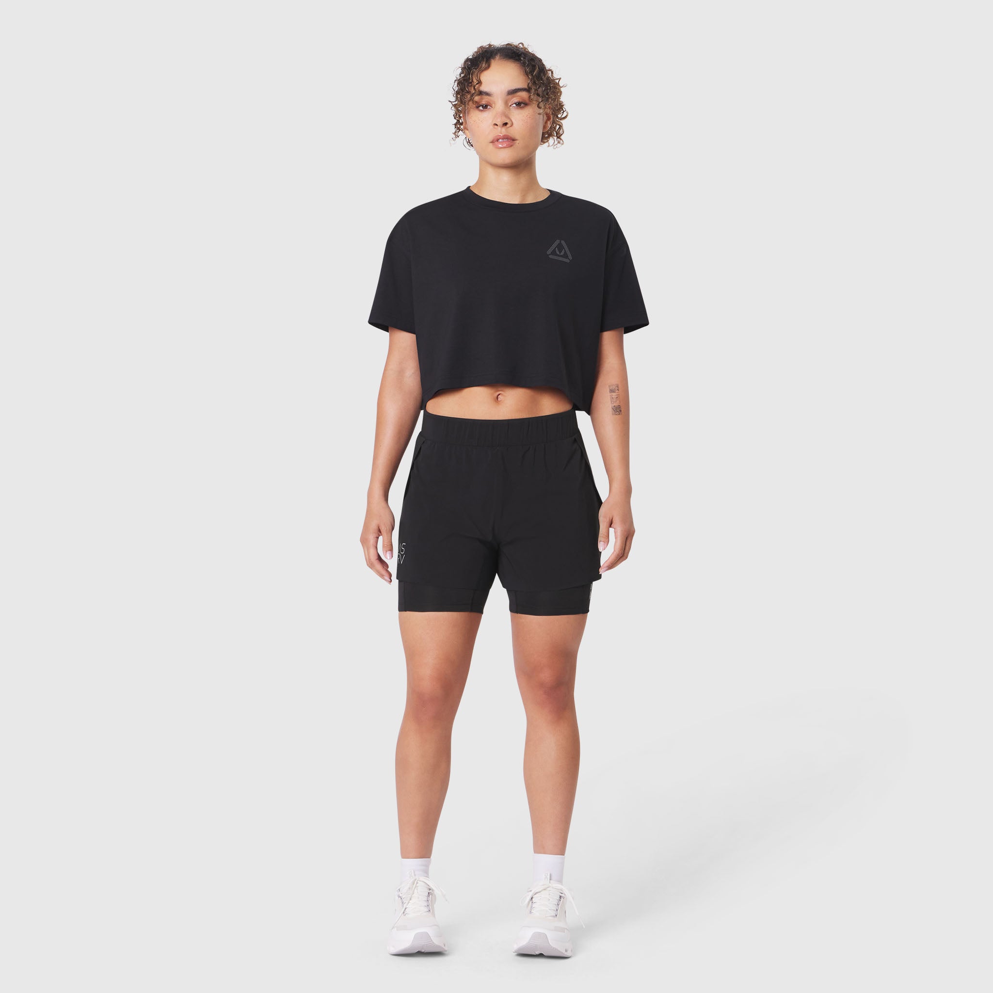 W082 Supima Ice-Skin Reversible Crop Tee in black on model, front view