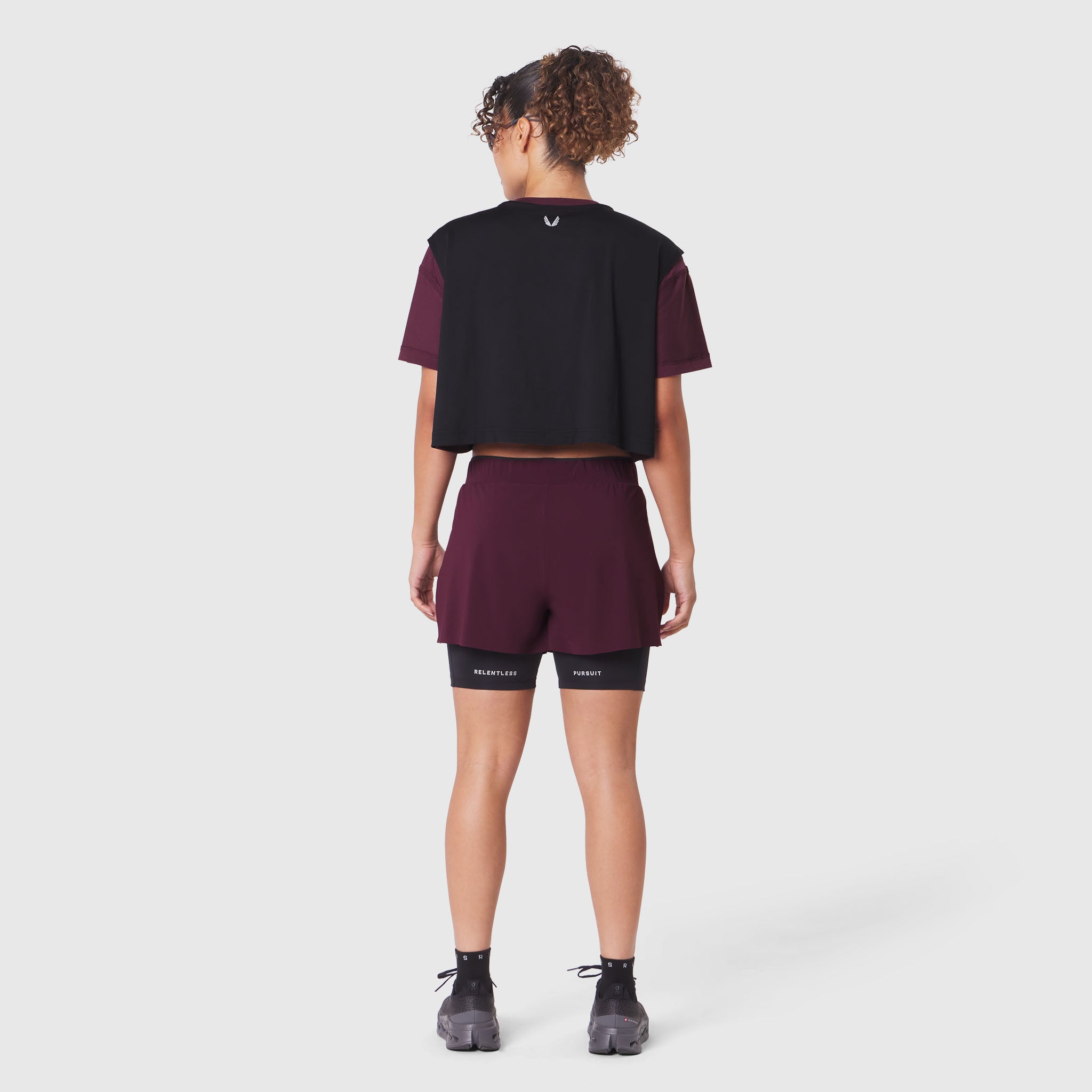 ASRV W082 Supima Ice-Skin Reversible Crop Tee in Merlot/Black, back view on model