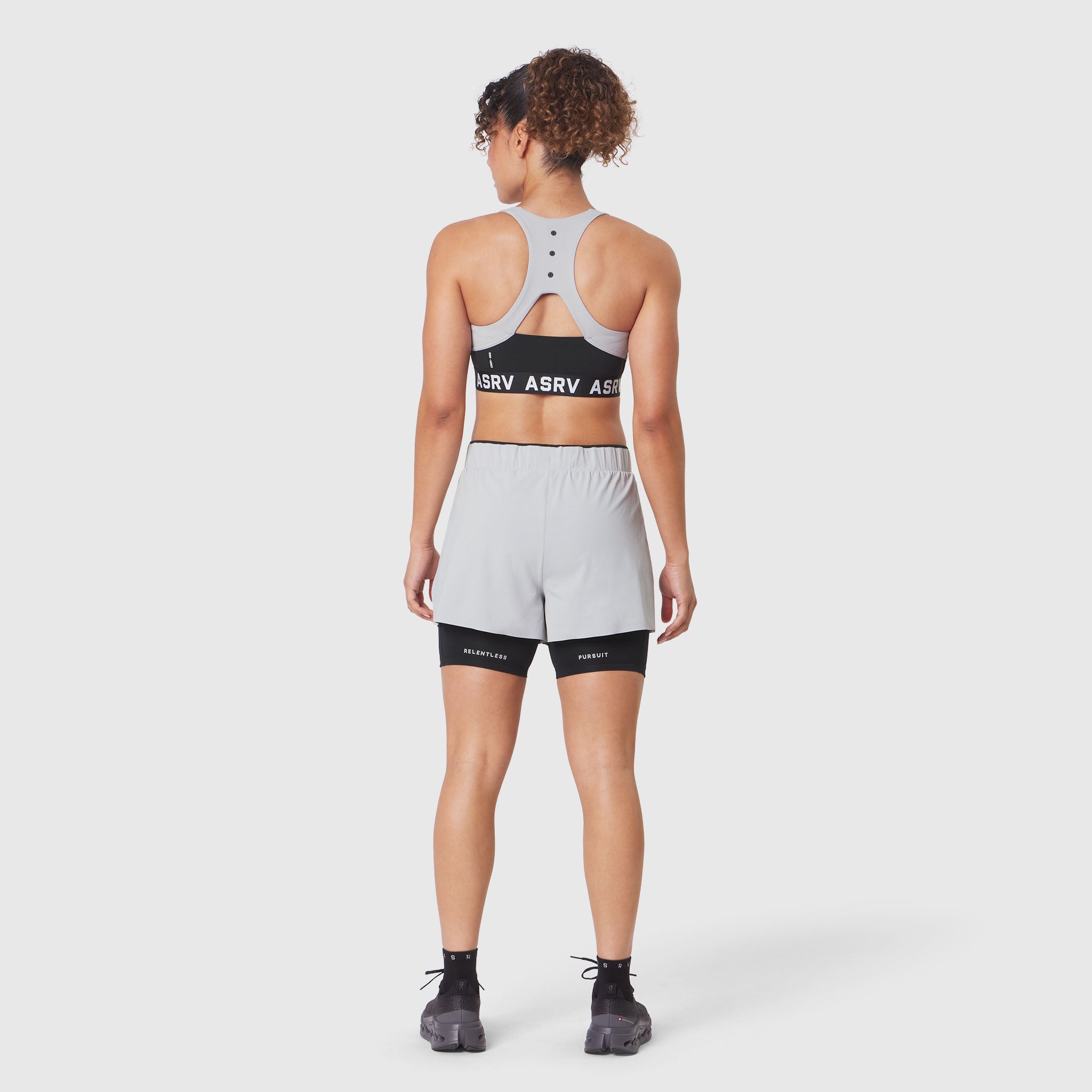 W083 LYCRA® ADAPTIV Racerback Sports Bra in slate grey, back view on model