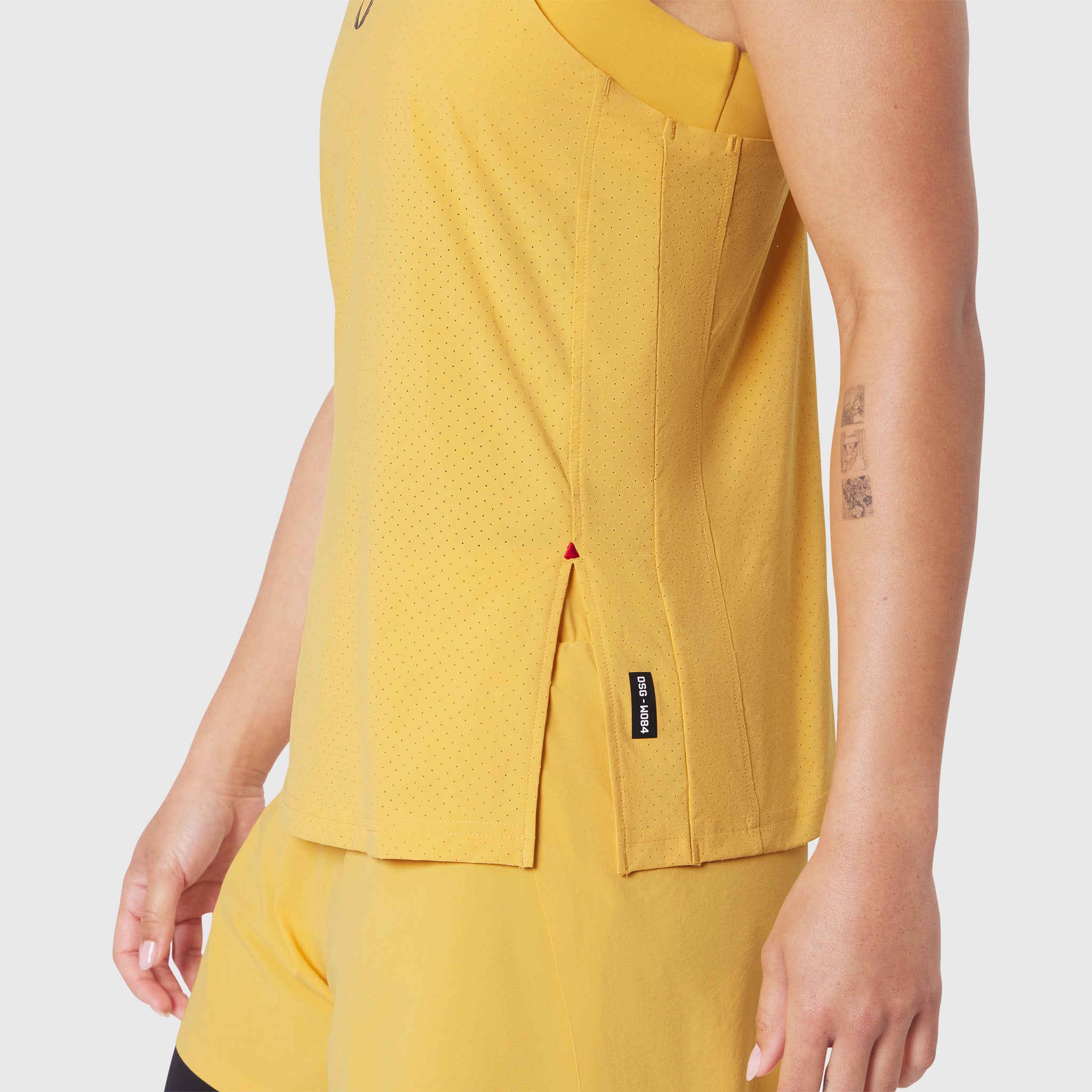 Aerotex™ Perforated Run Tank in Amber, side view on model