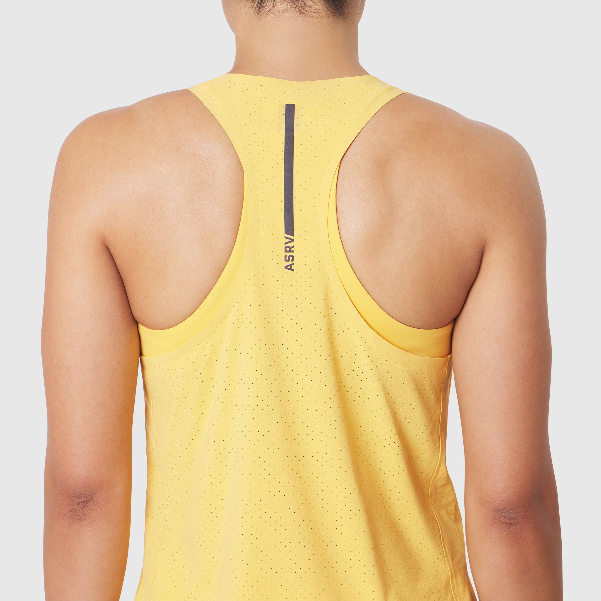 Aerotex™ Perforated Run Tank in Amber, back view on model