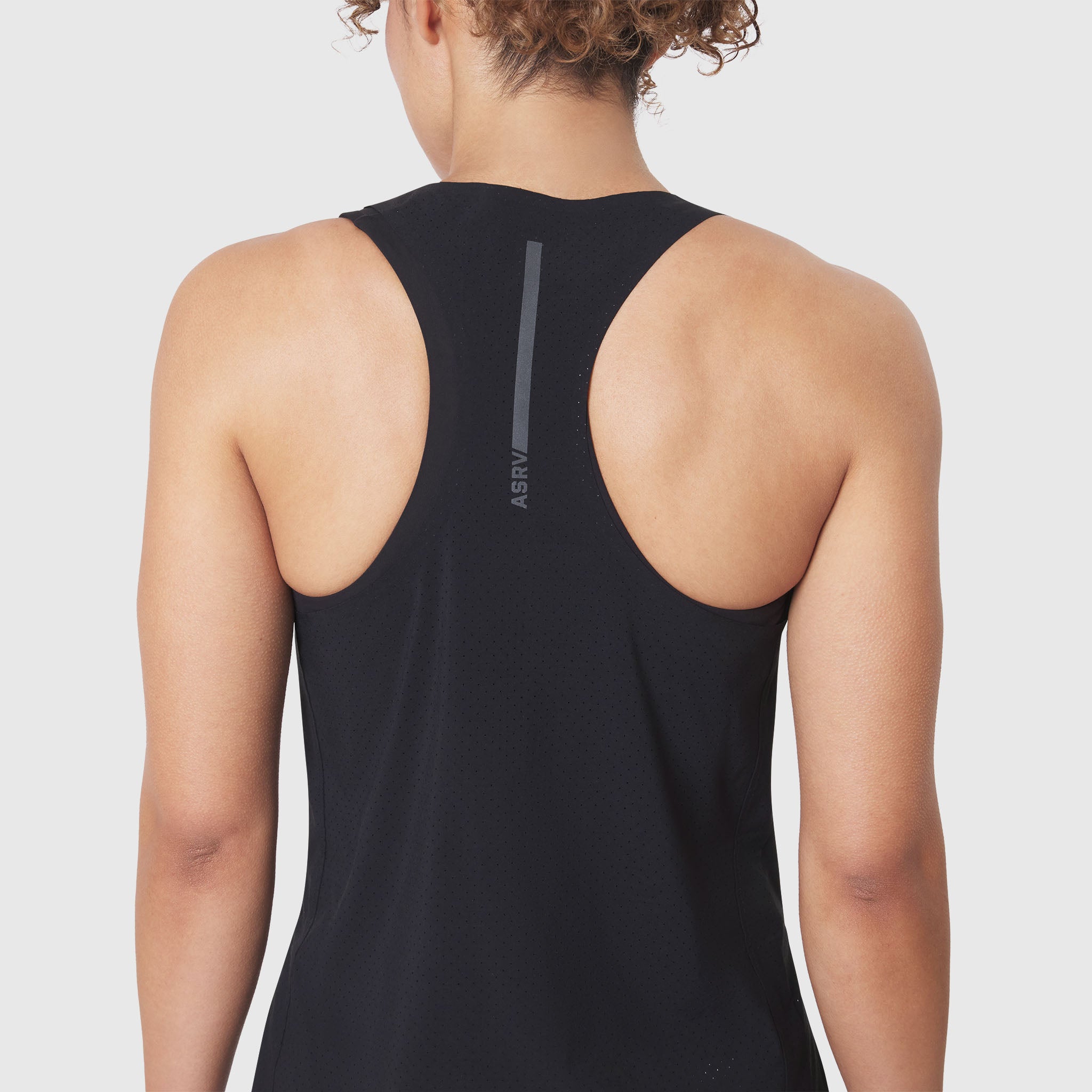 Aerotex Perforated Run Tank in black, back view on model