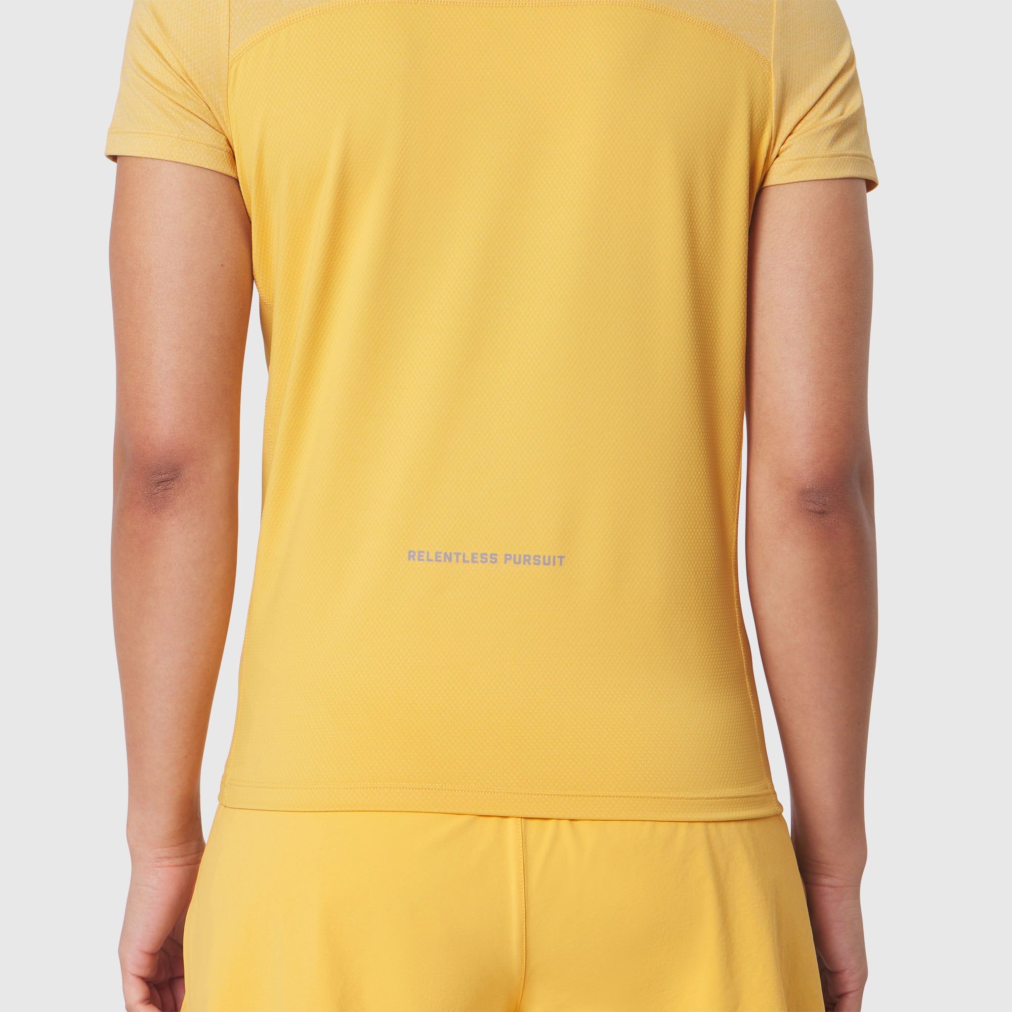 AEROSILVER® UPF50+ Run Tee in Amber, back view on model