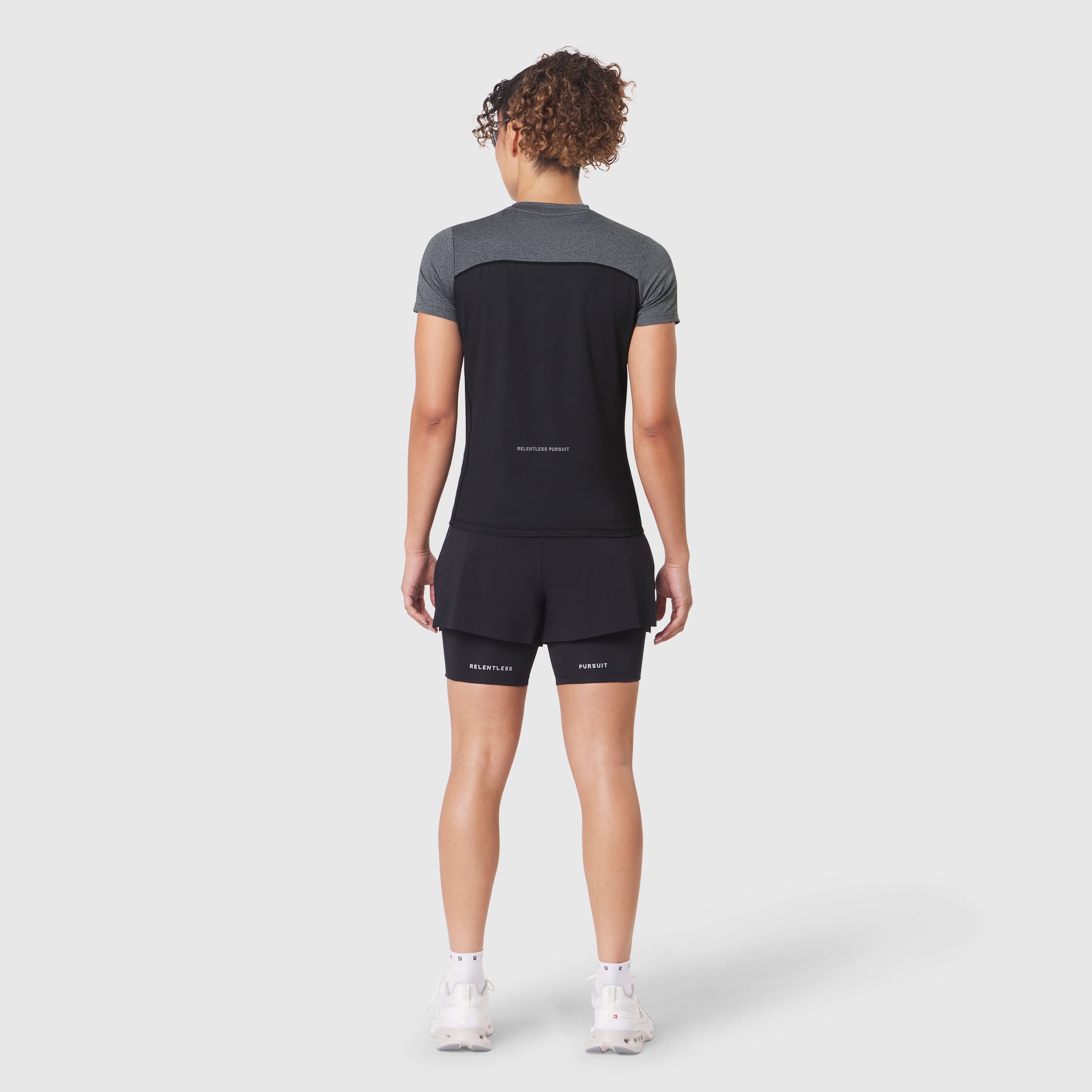 W086 AEROSILVER® UPF50+ Run Tee in Black, back view on model