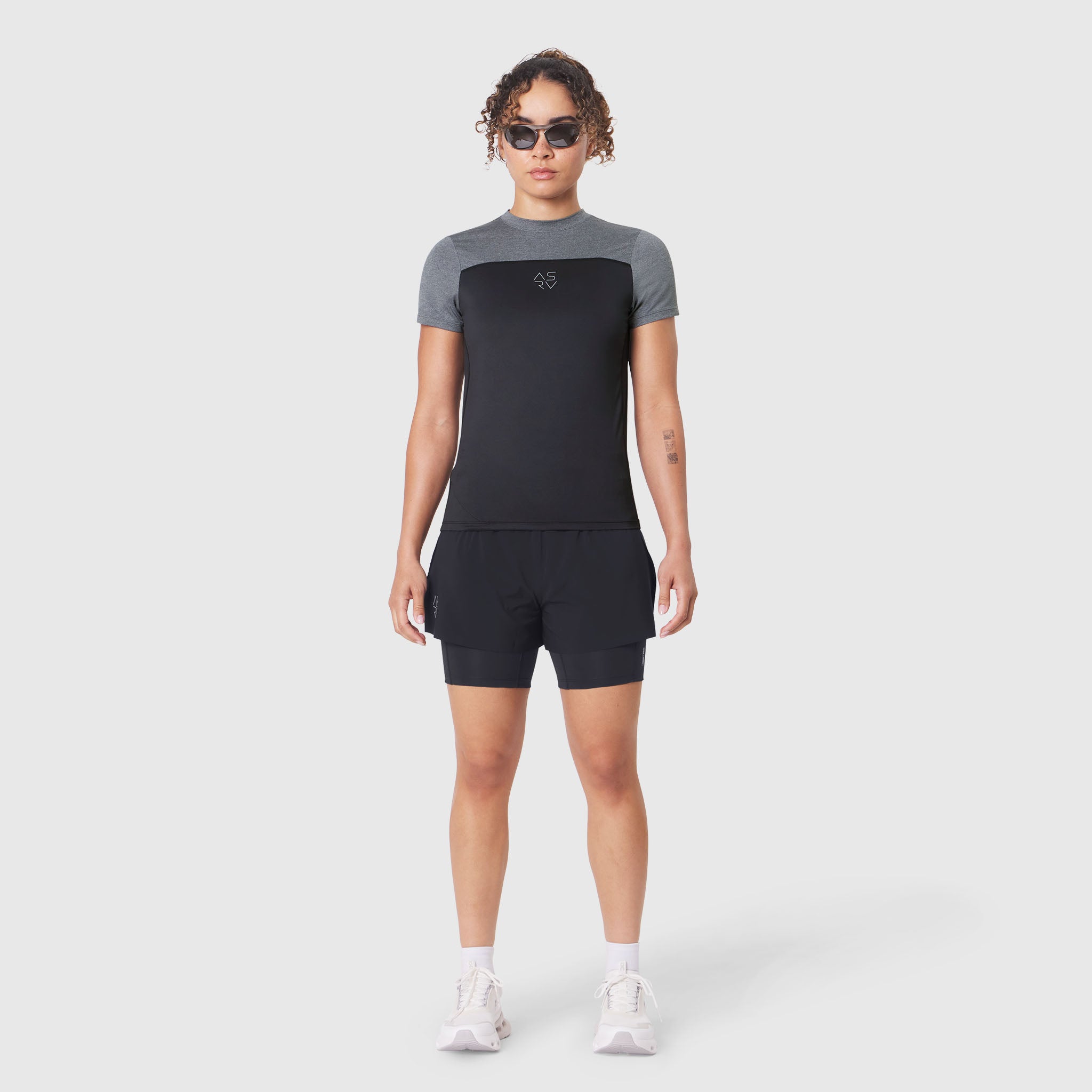 W086 AEROSILVER® UPF50+ Run Tee in black with grey sleeves, front view on model