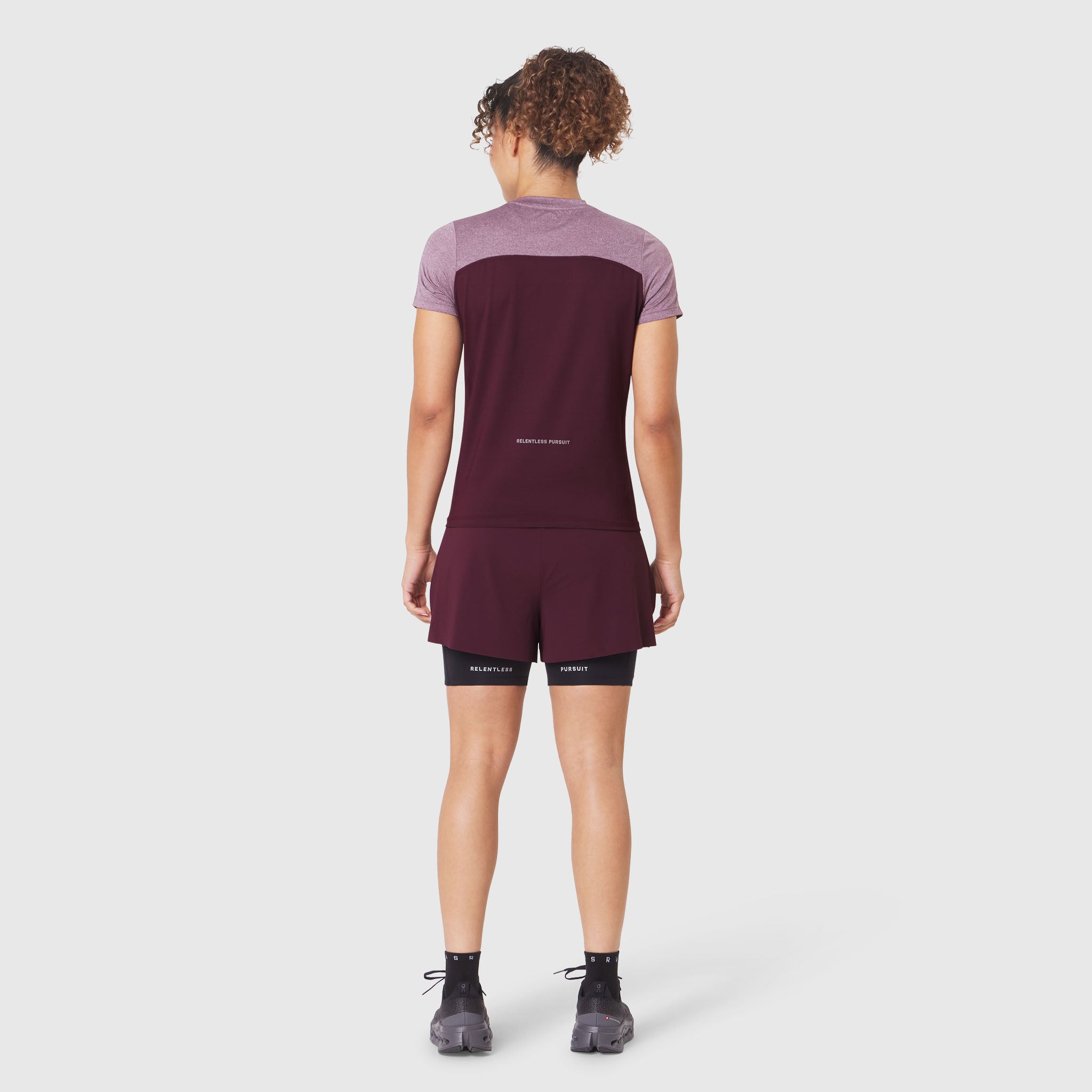 W086 AEROSILVER® UPF50+ Run Tee in Merlot, back view on model