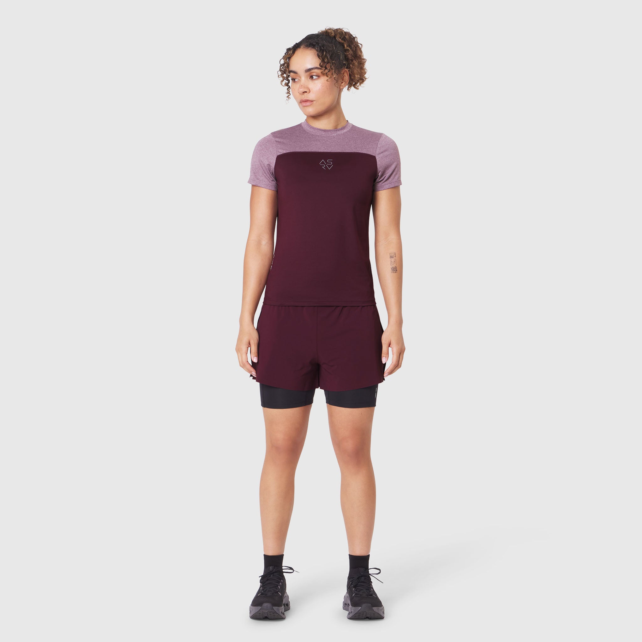 W086 AEROSILVER® UPF50+ Run Tee in Merlot, worn with matching shorts, front view