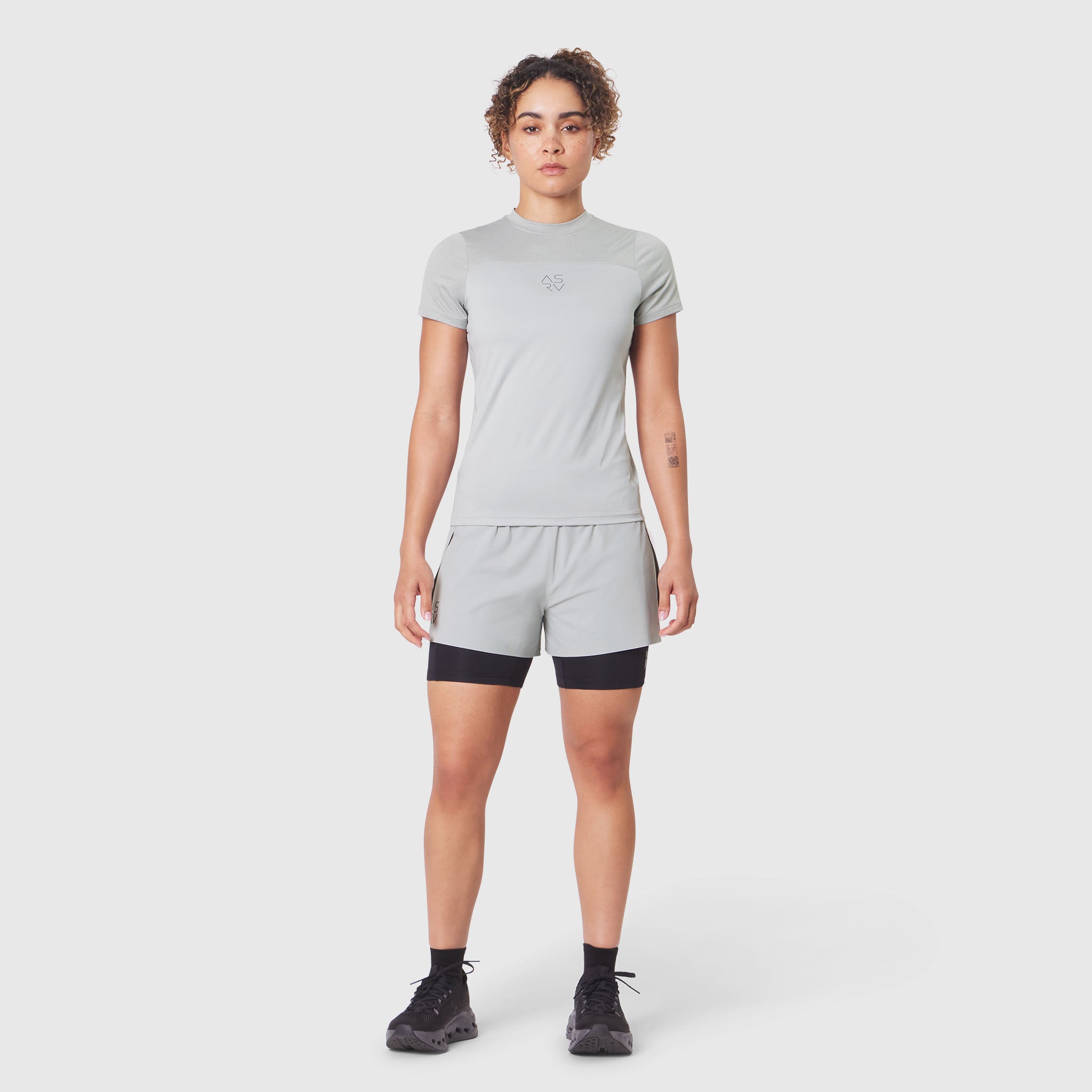 W086 AEROSILVER UPF50+ Run Tee in Slate Grey, worn by model with matching shorts, front view