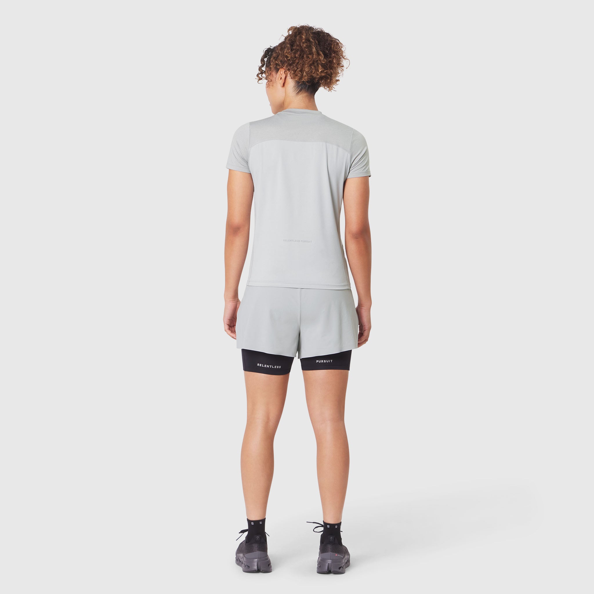 W086 AEROSILVER UPF50+ Run Tee in Slate Grey, back view on model