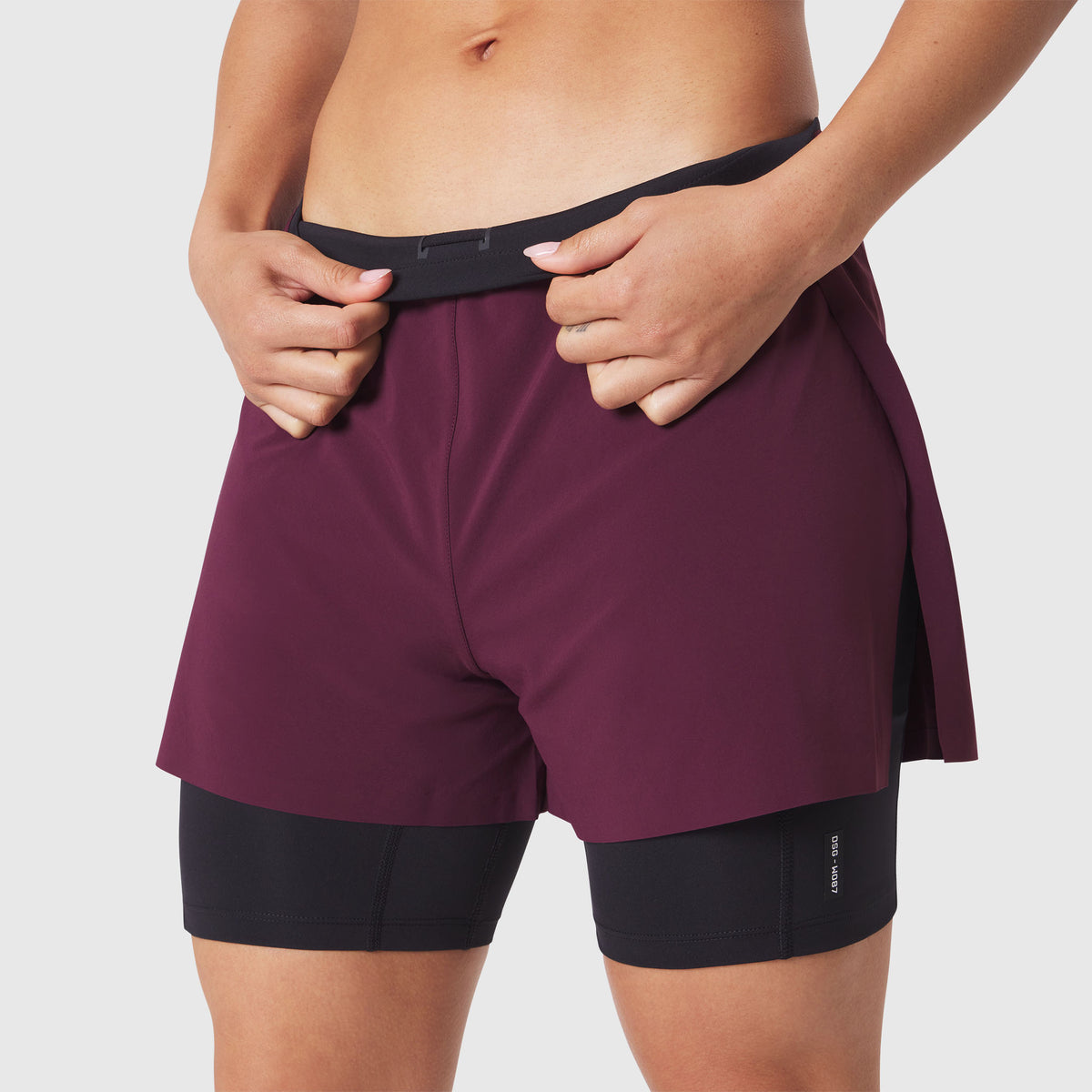 W087 Aerotex Side Split Liner Short in merlot, worn by model, front view