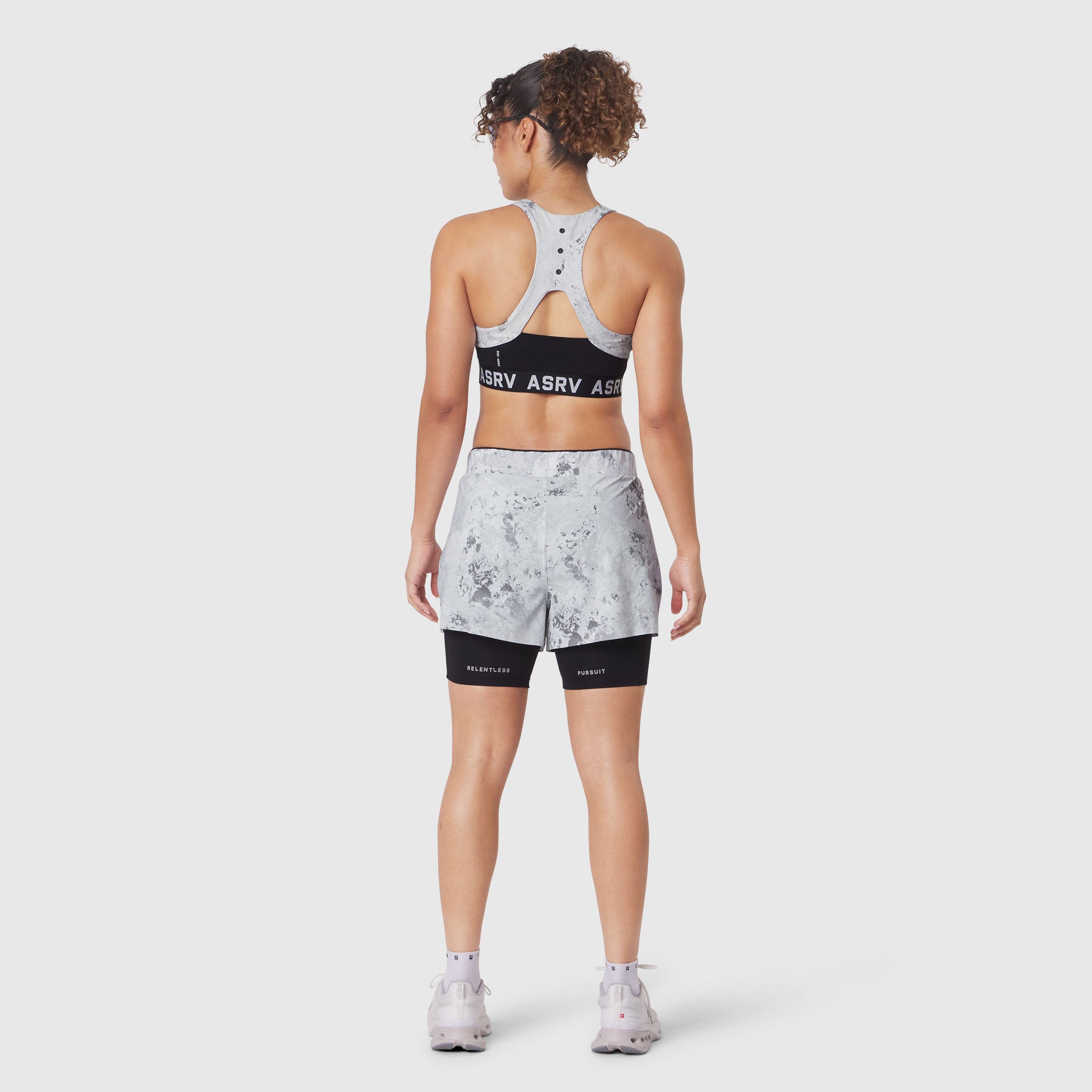 W087 Aerotex Side Split Liner Short in Sedona Snow Camo, back view on model