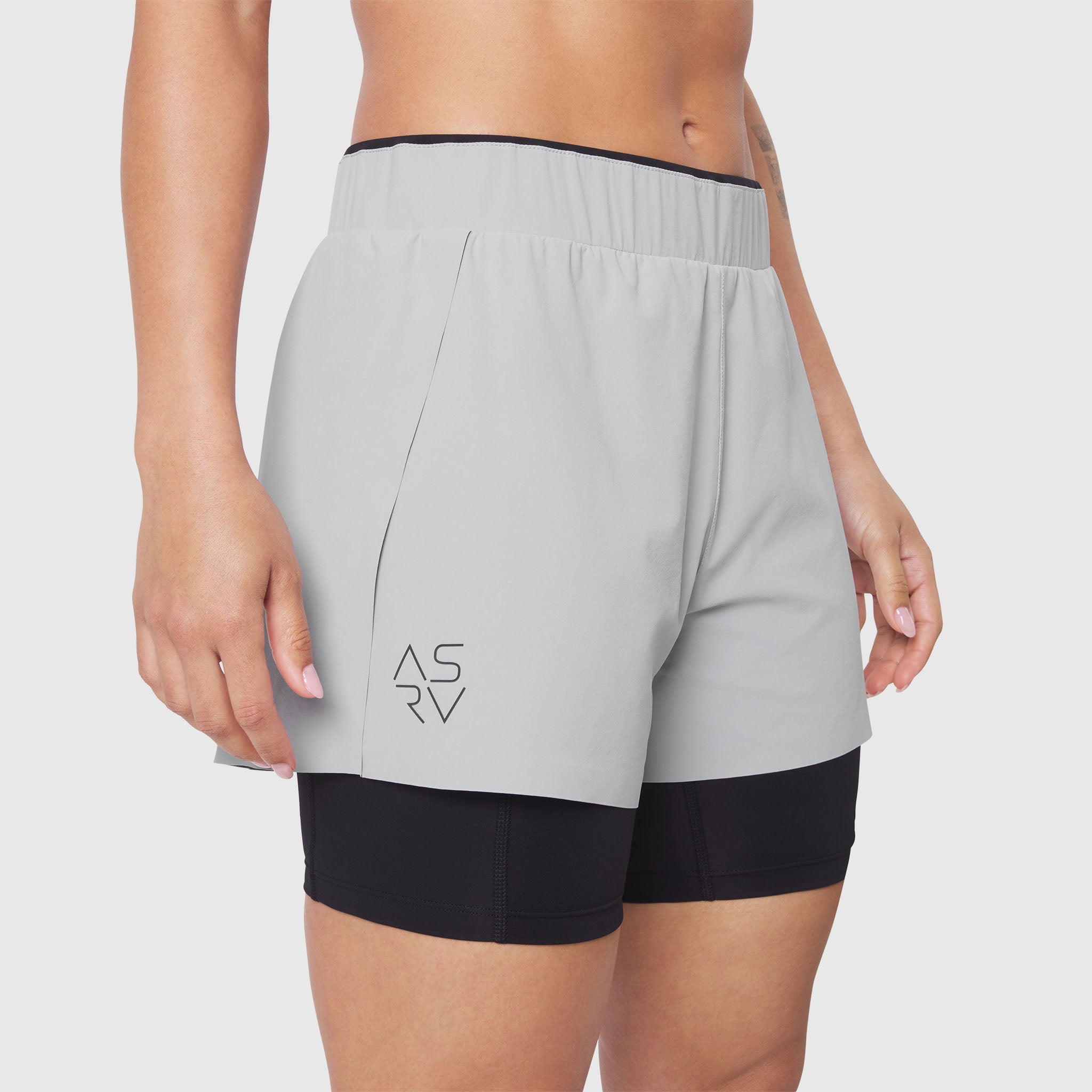 W087 Aerotex Side Split Liner Short in Slate Grey, worn by model, side view