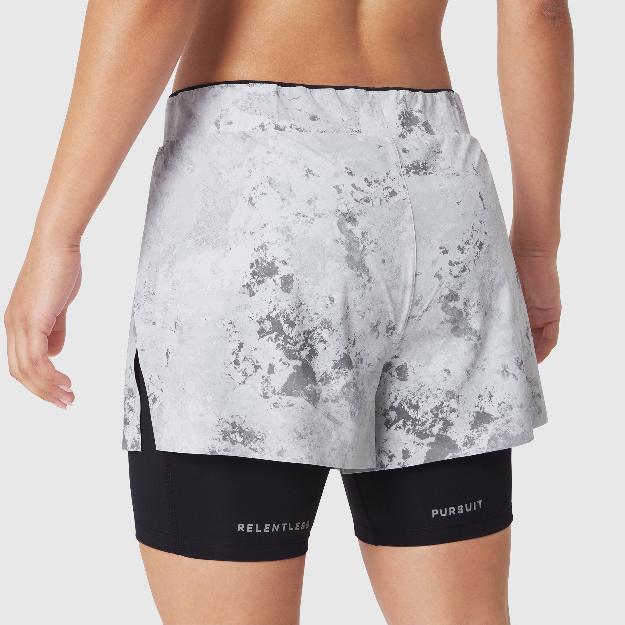 W087 Aerotex Side Split Liner Short in Sedona Snow Camo, back view on model