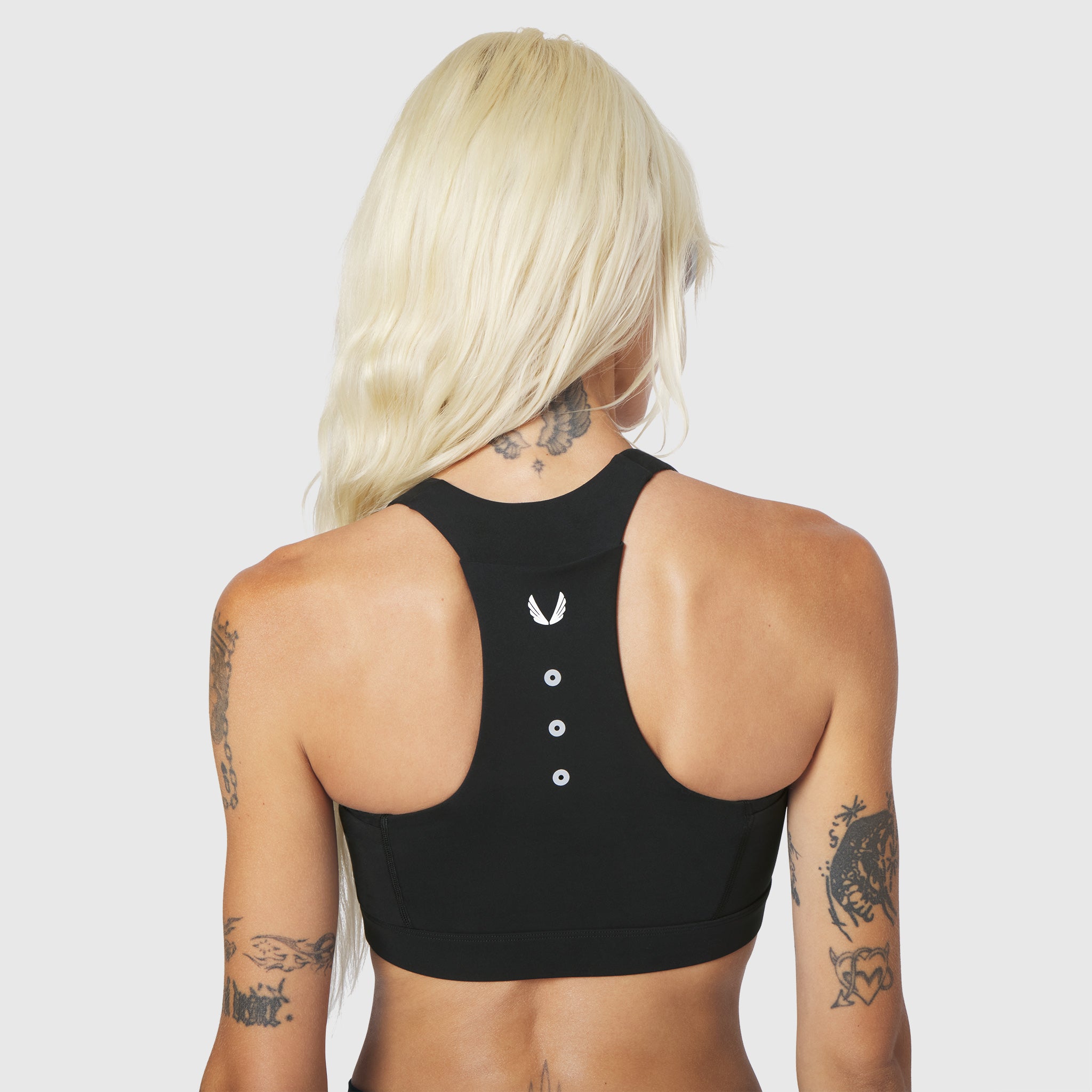 W096 LYCRA® ADAPTIV Racerback Sports Bra in black, back view on model