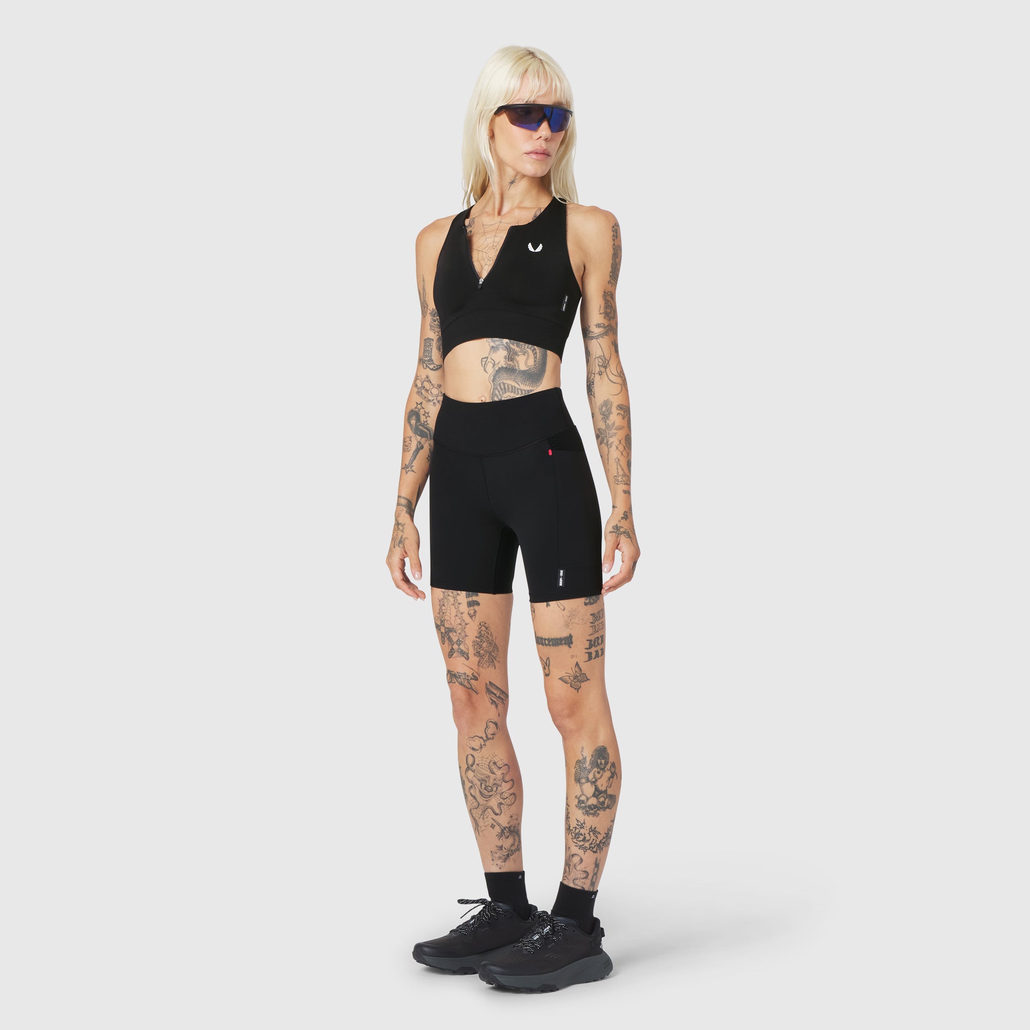 W097 LYCRA® ADAPTIV Seamless Zip Bra in black, front view on model
