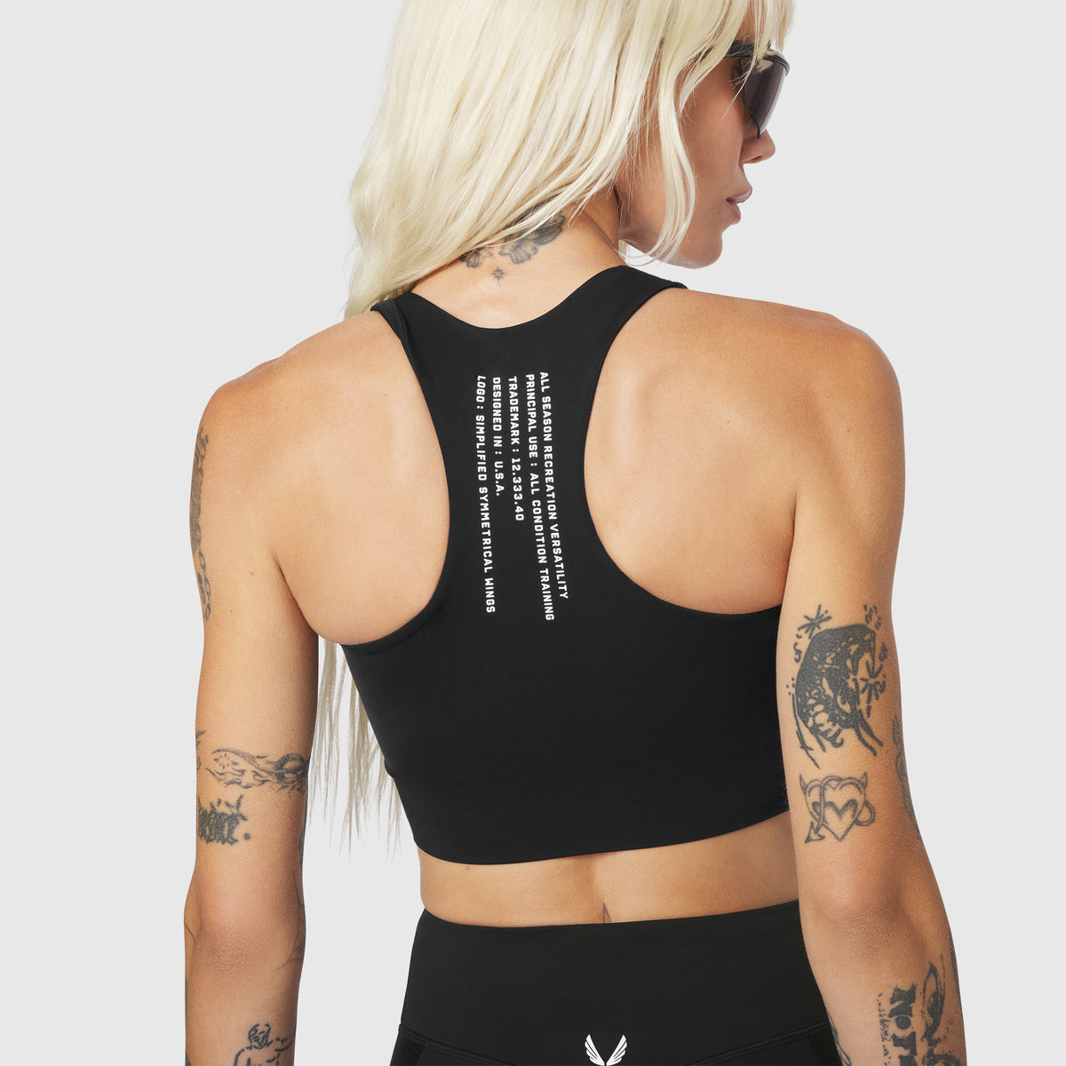 W097 LYCRA® ADAPTIV Seamless Zip Bra in black, back view on model