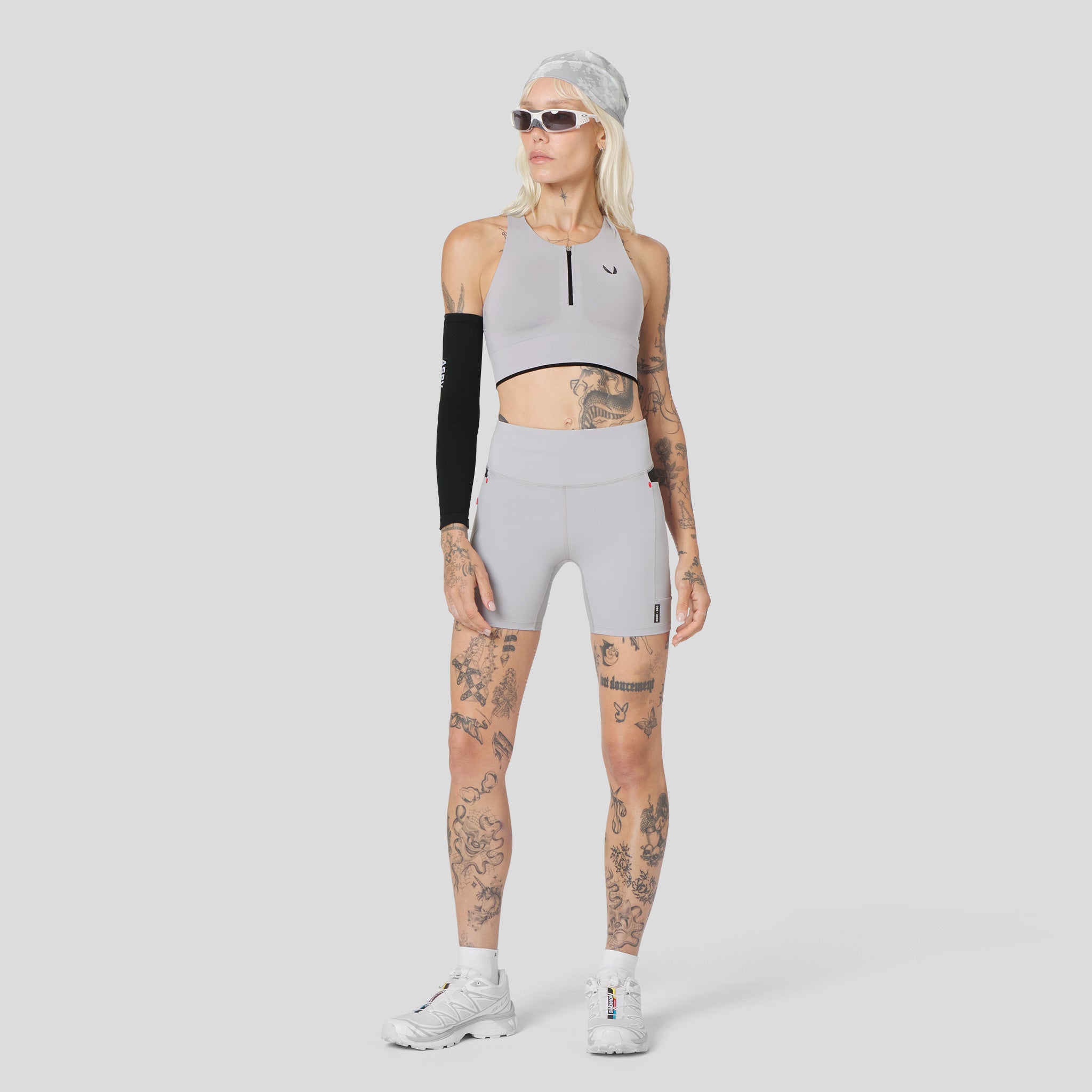 W097 LYCRA® ADAPTIV Seamless Zip Bra in Slate Grey, worn with matching shorts
