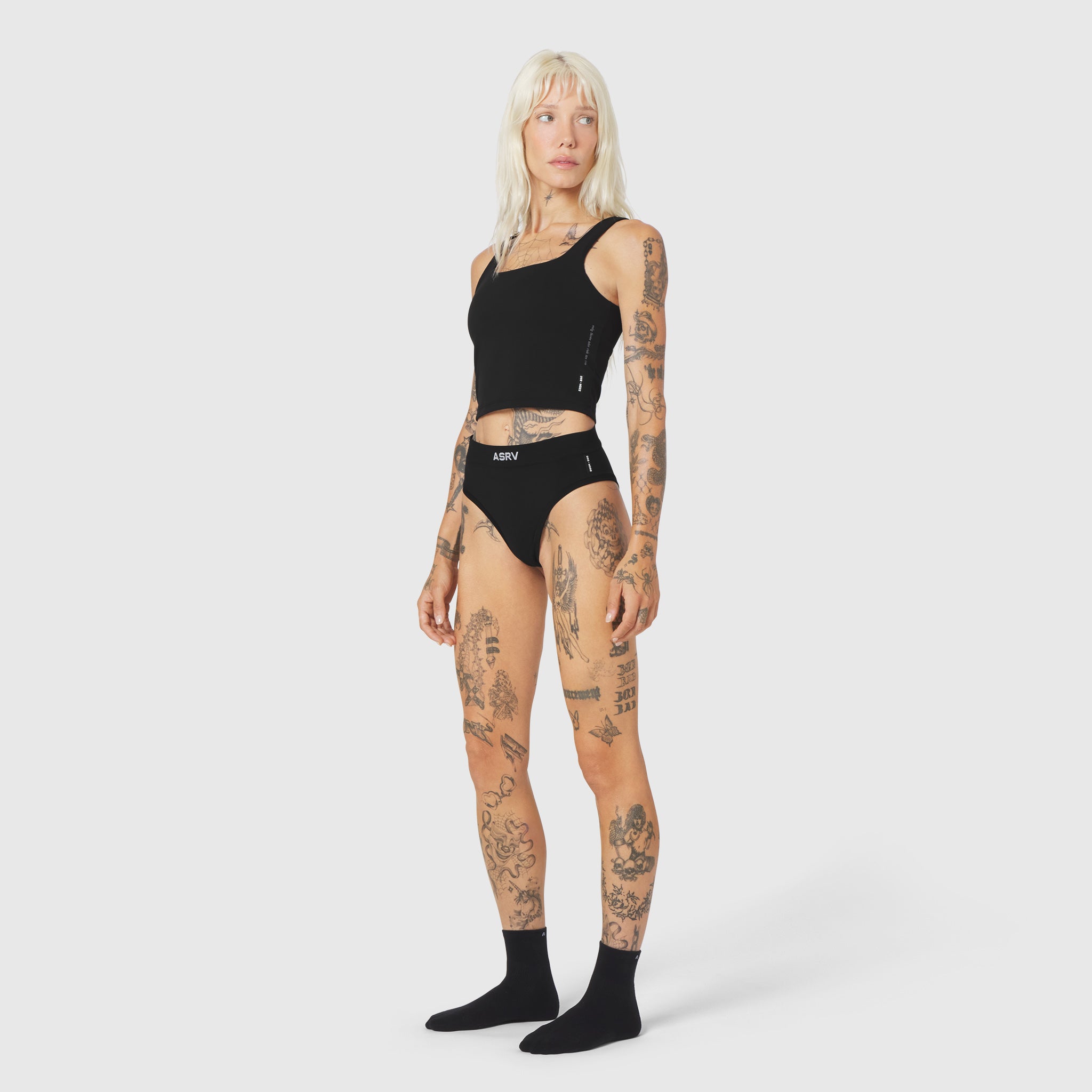 W098 LYCRA® ADAPTIV Seamless Underwear in black, worn by model, full-length front view