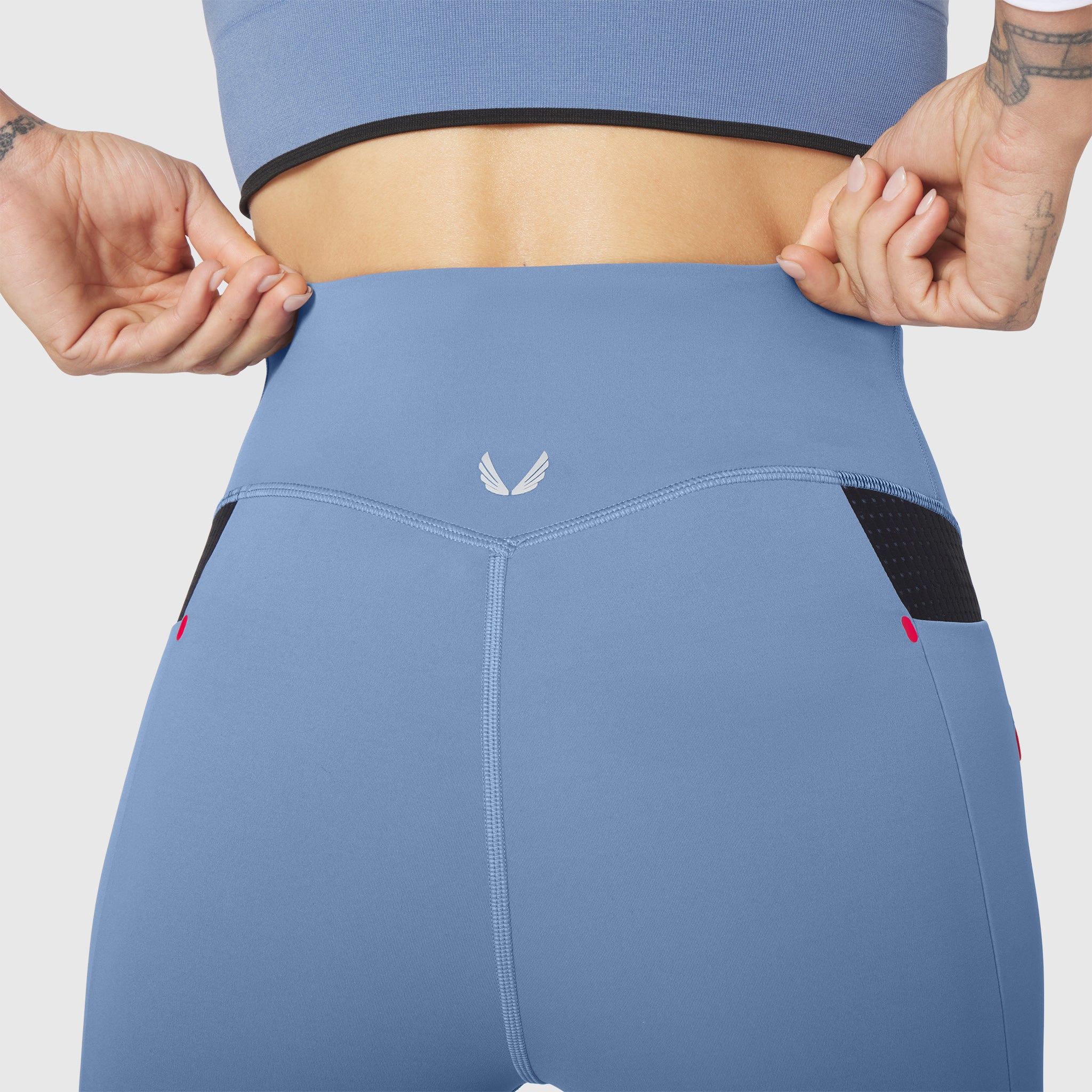 W099 LYCRA® ADAPTIV Hybrid Bike Short in Slate Blue, back view on model