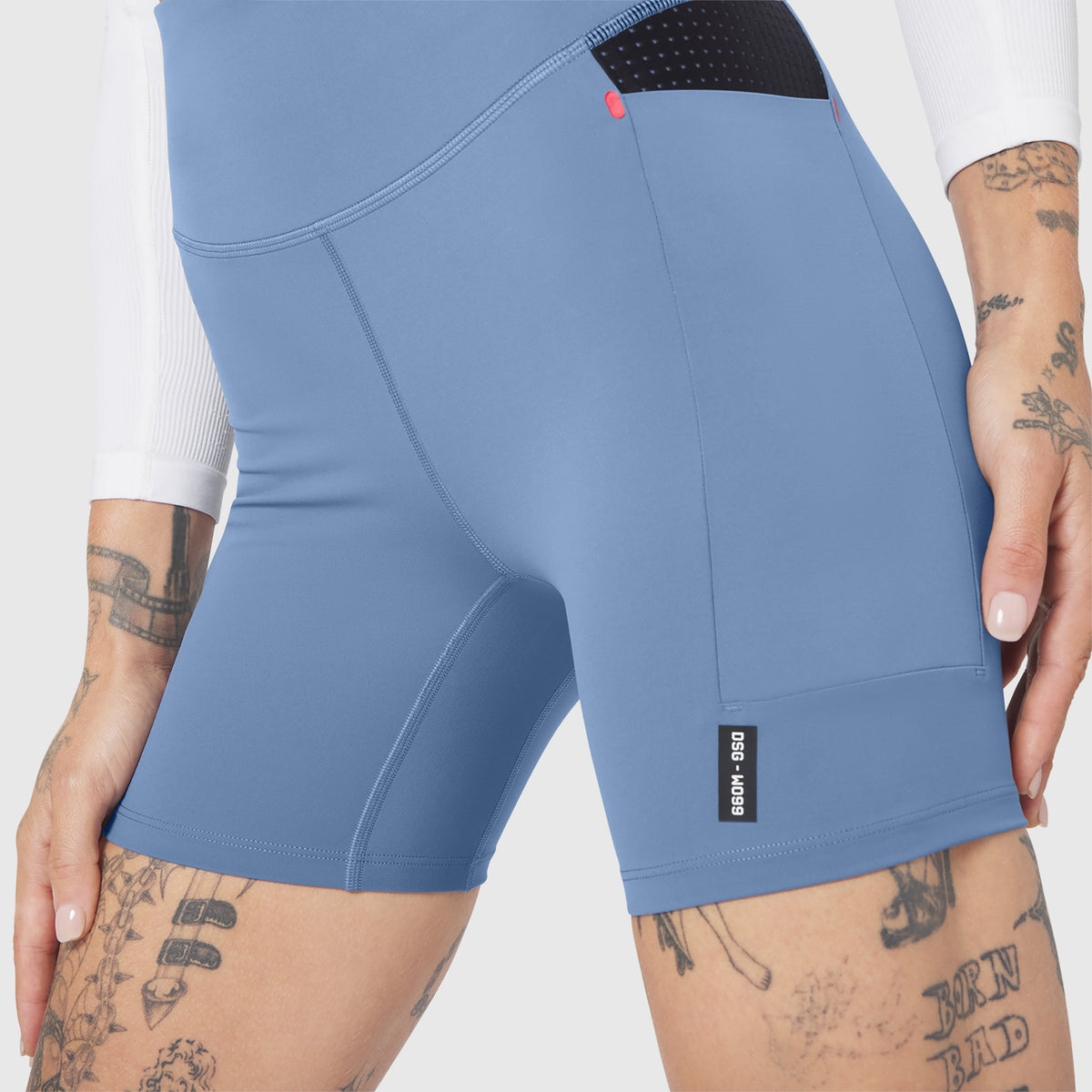 W099 LYCRA® ADAPTIV Hybrid Bike Short in Slate Blue, worn by model
