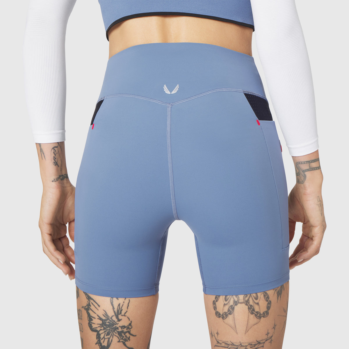 W099 LYCRA® ADAPTIV Hybrid Bike Short in Slate Blue, back view on model