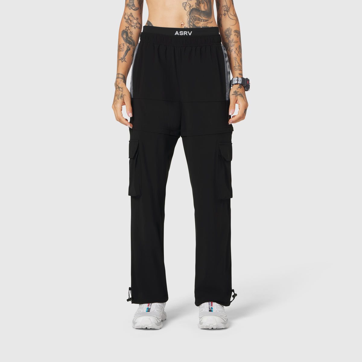 W100 2-in-1 Convertible Pant in black, front view on model
