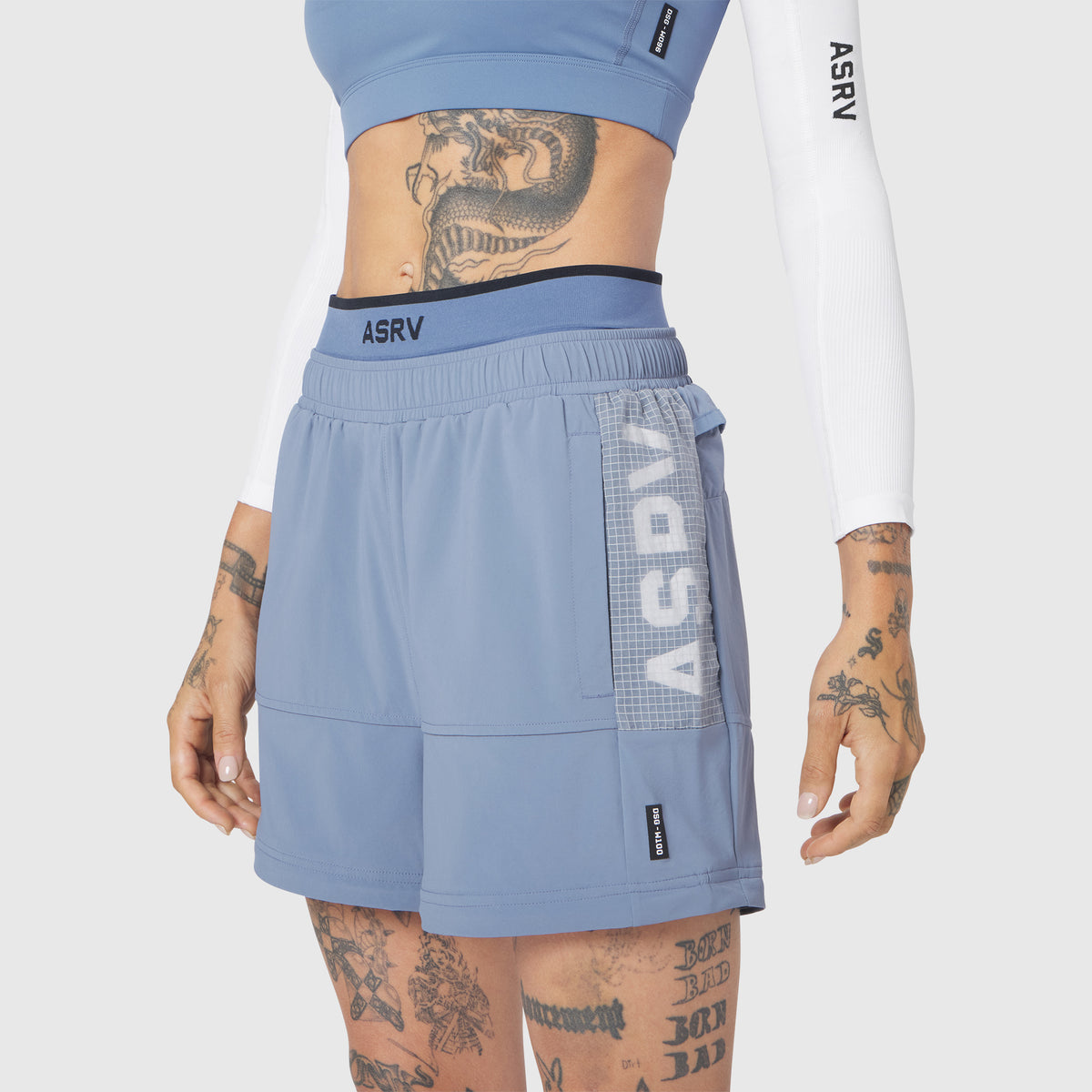 W100 2-in-1 Convertible Pant in Slate Blue, worn by model, front view