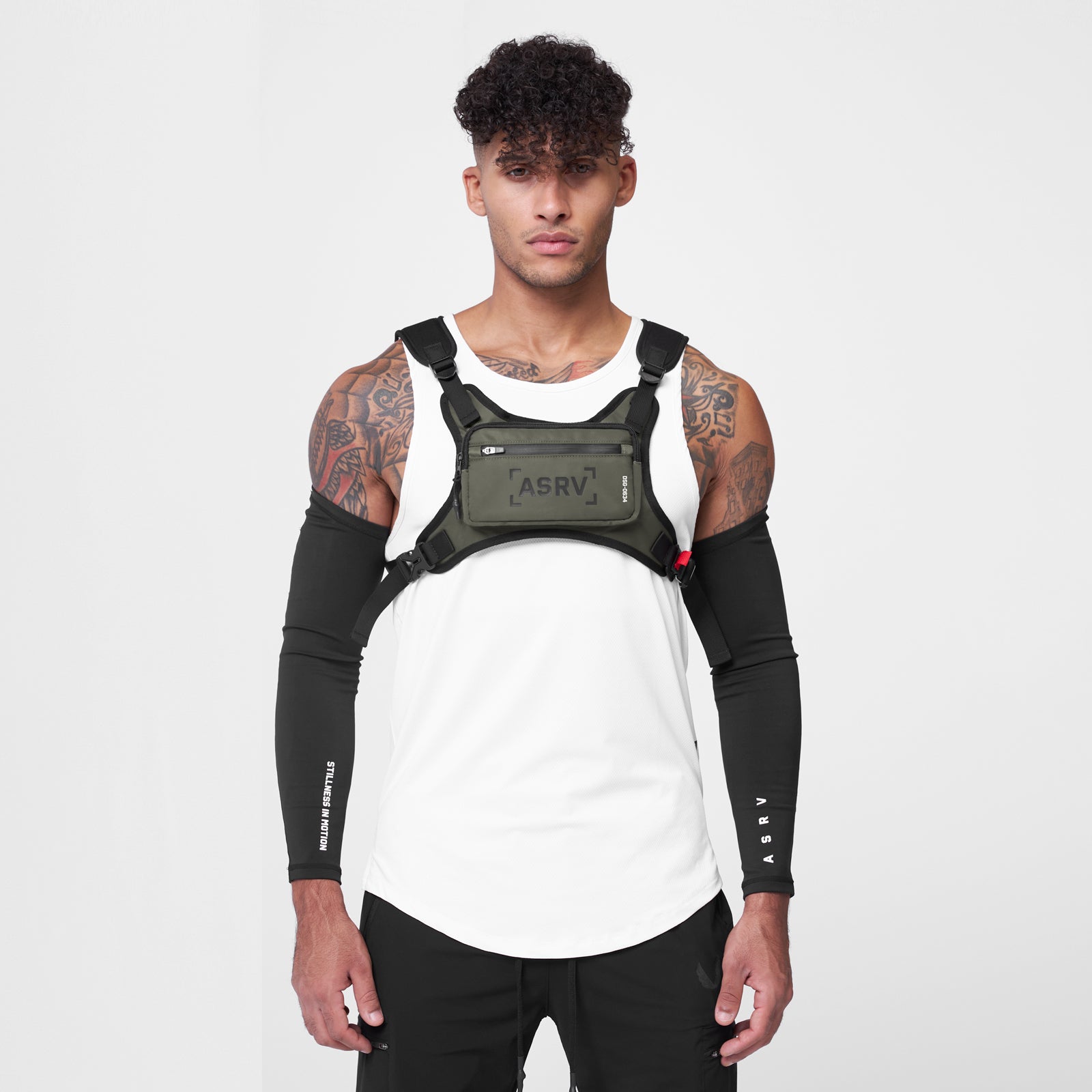 0634 Conditioning Chest Pack in olive, worn by male model with arm sleeves