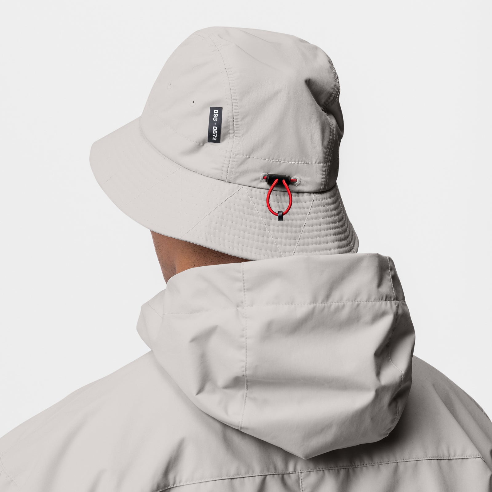 Hipora® Bucket Hat in Stone, back view worn on model
