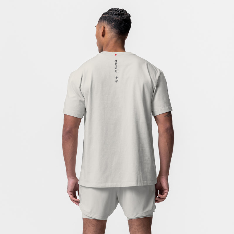 0669. Technical Essentials Relaxed Tee - Stone