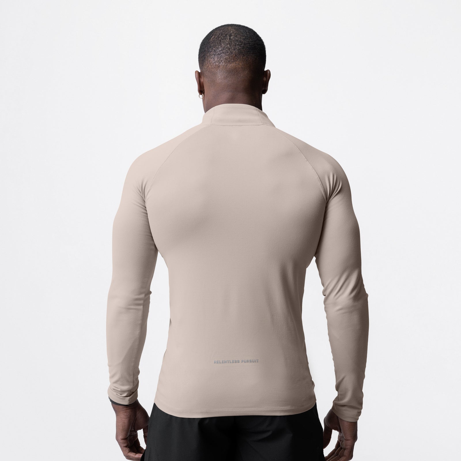 Core Fitted Quarter Zip in Chai, back view on model